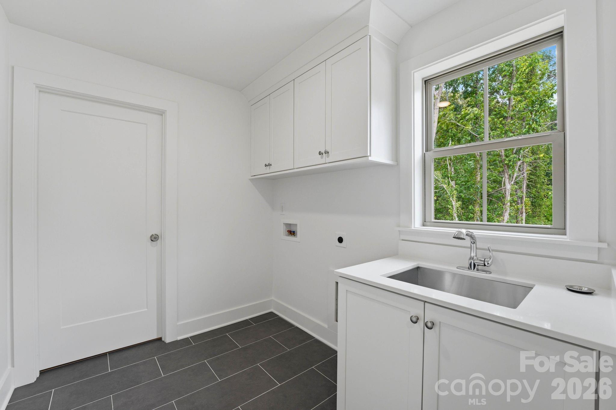 Laundry room. - 2315 Chateau Court, Matthews