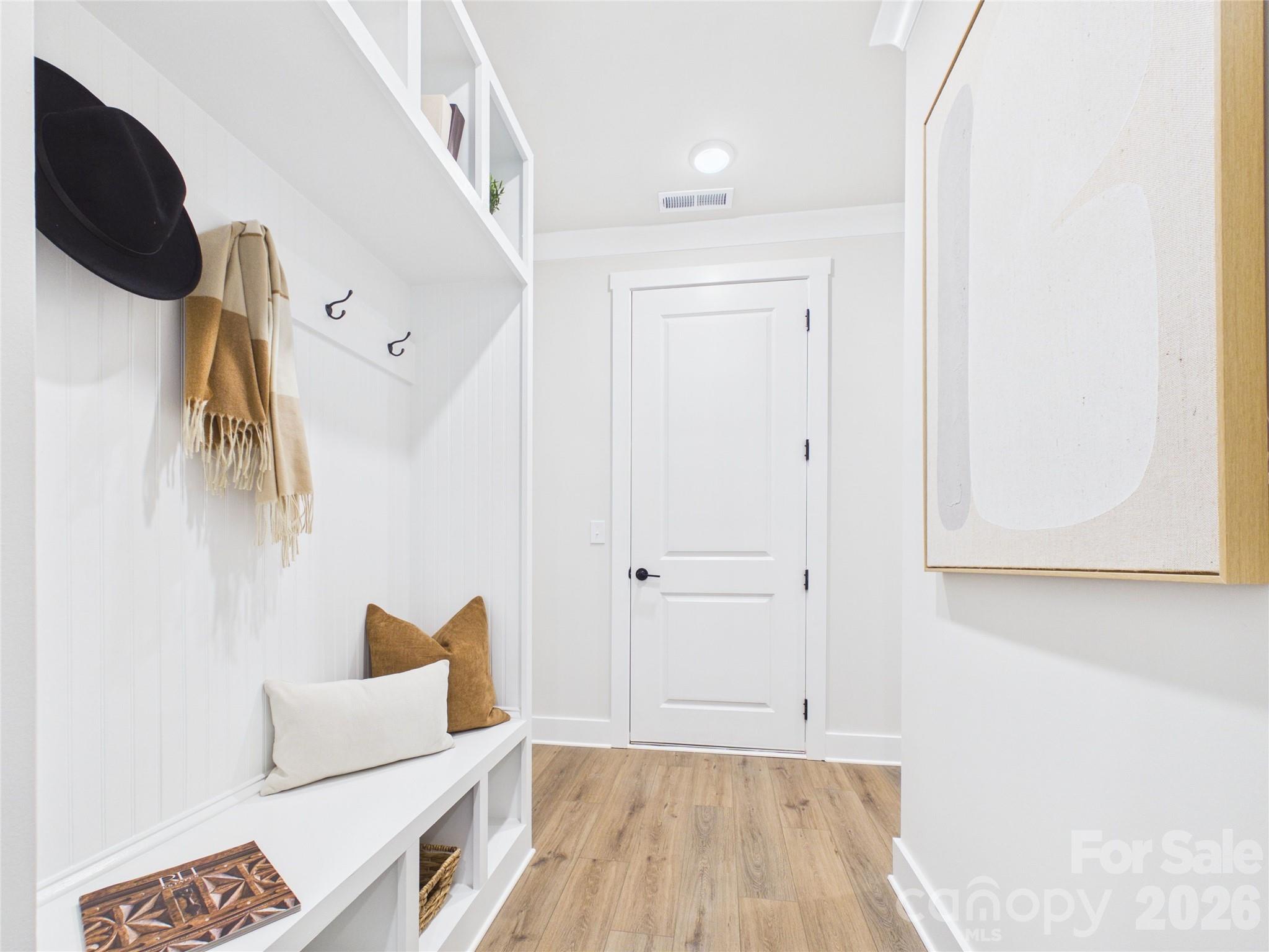 Drop Zone between garage, walk-in pantry and 2nd entry. - 1065 Rolling Meadows Drive, Mooresville