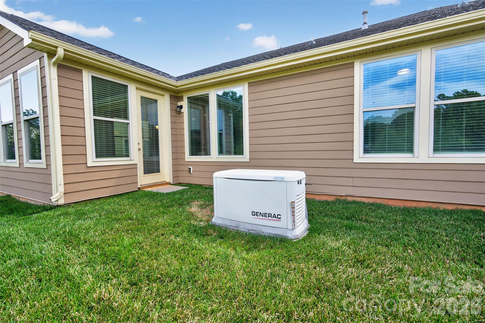 backyard overlooking the whole home generator - 127 Johnson Manor Street, Mooresville