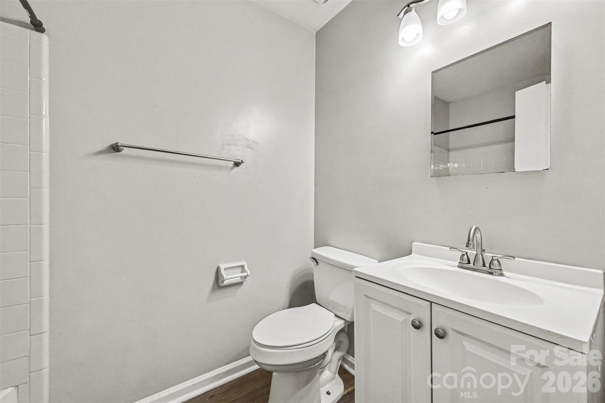 The second bath features a vanity with solid surface sink and more... - 6165 Meadow Rose Lane, Charlotte