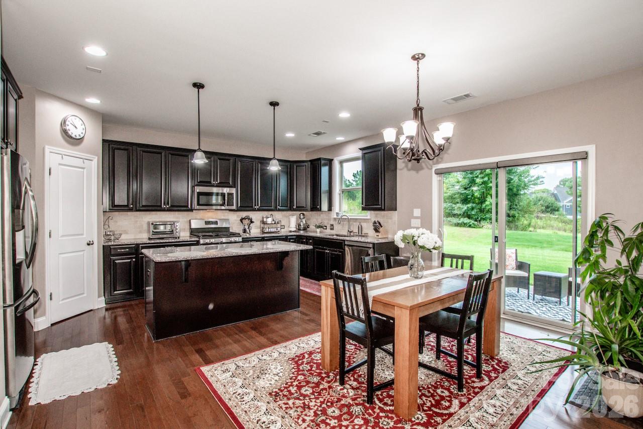 Kitchen is right off of the patio, perfect for entertaining - 130 Eagles Landing Drive, Mooresville