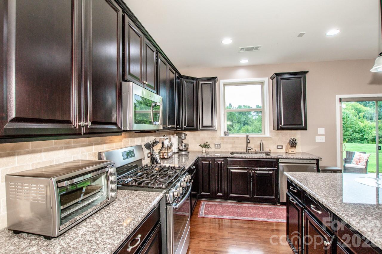 So much recessed lighting - 130 Eagles Landing Drive, Mooresville