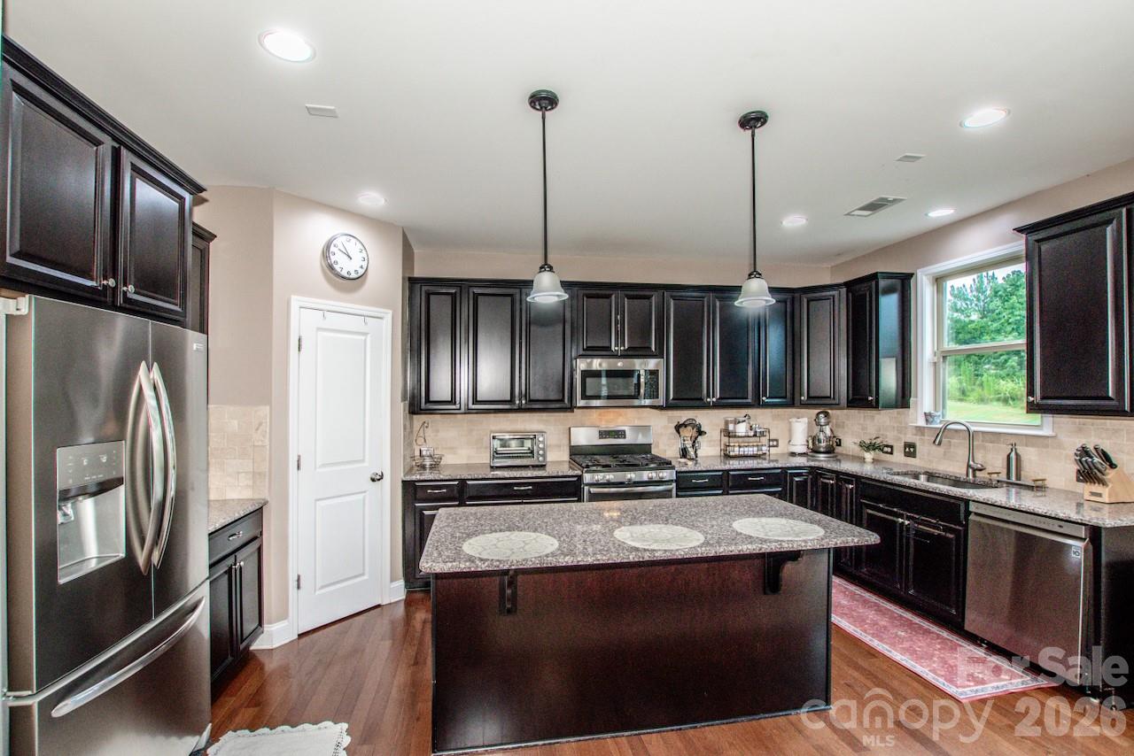 Walk-in pantry with plenty of storage - 130 Eagles Landing Drive, Mooresville