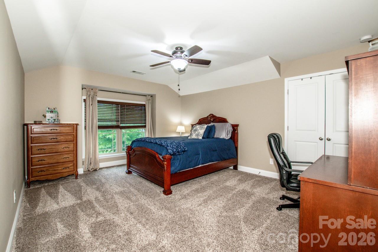 Large secondary bedroom upstairs - 130 Eagles Landing Drive, Mooresville