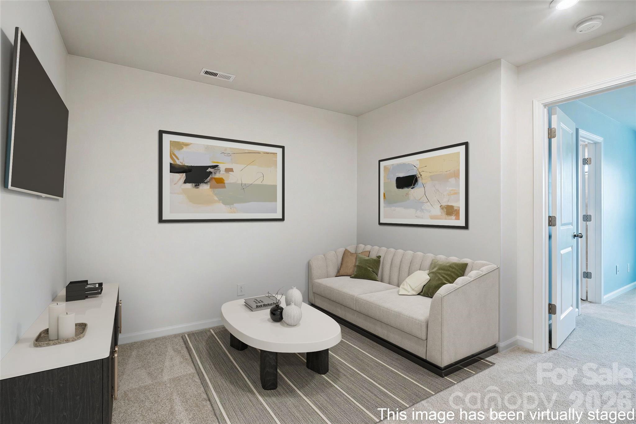 Loft area virtually staged. Wall does have outlet & cat5 for a TV. Bracket not included. - 608 Cassidy Court, Clover