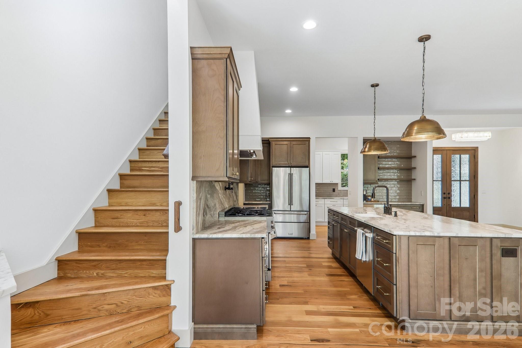 kitchen and stairs to second story - 318 Mountain Home Trail, Brevard