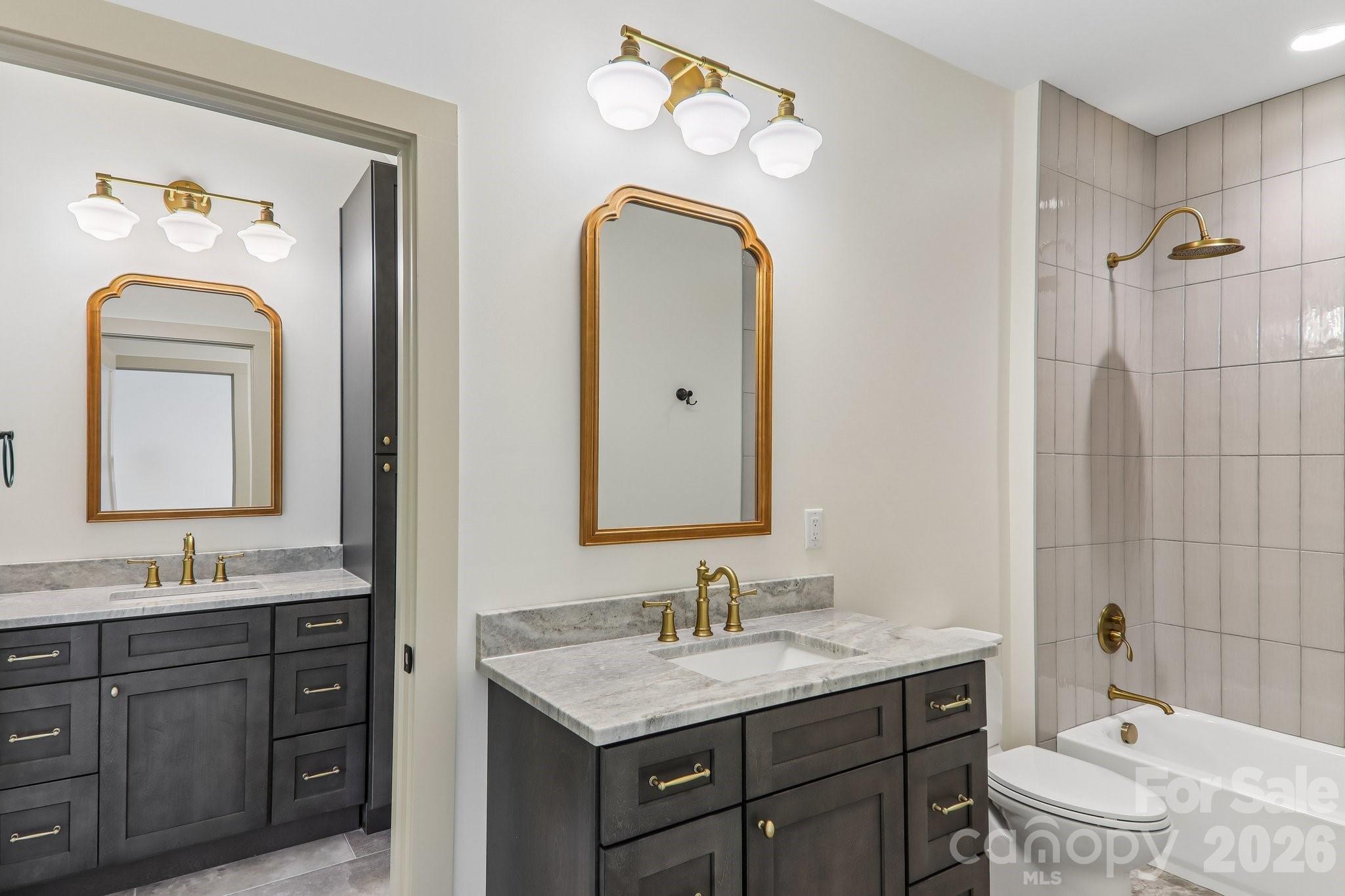 4th bath showing additional vanity attached to bonus room - 318 Mountain Home Trail, Brevard