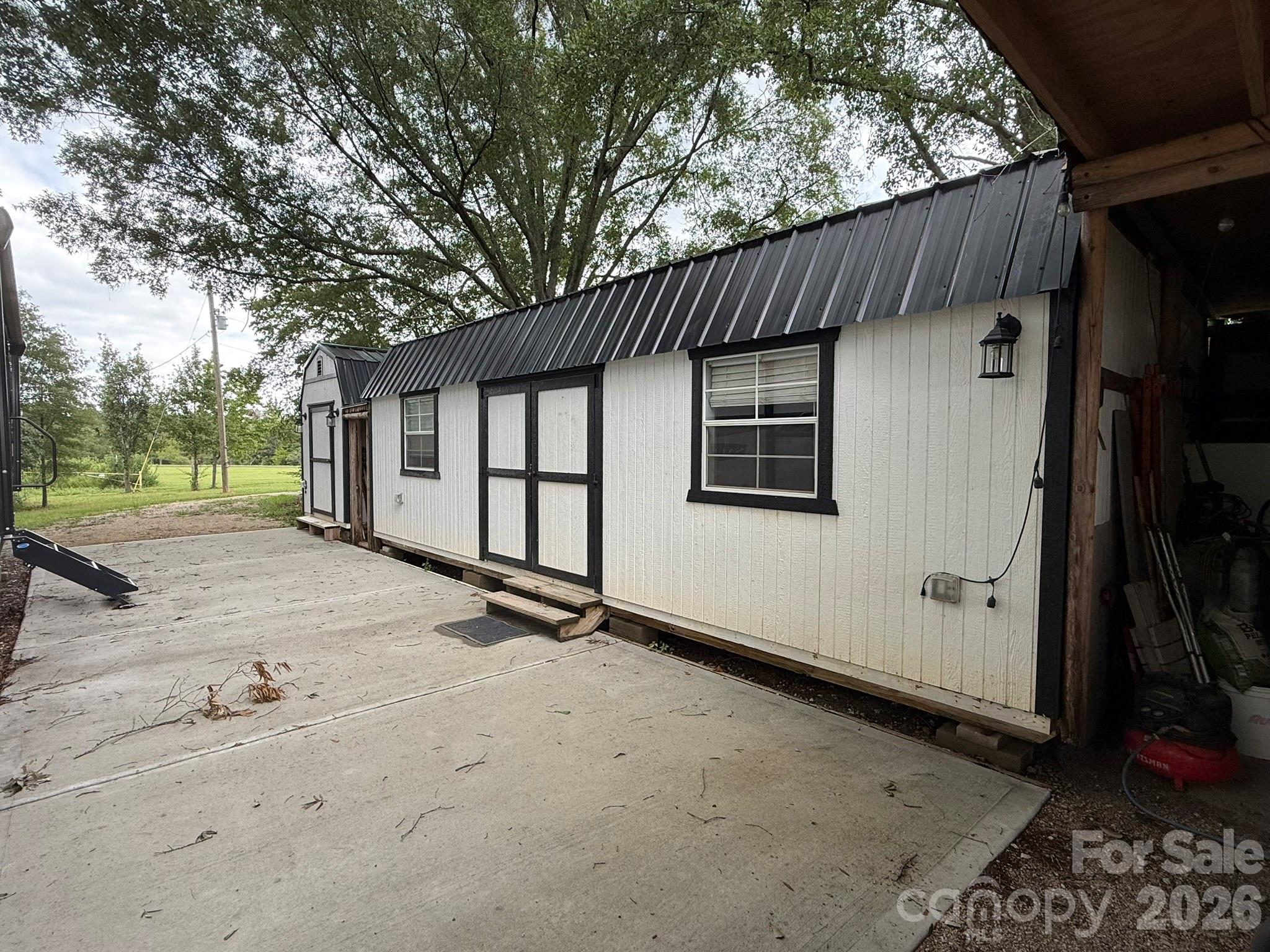 This storage building has been converted into an outdoor living space - 1726-c Old Cheraw Highway, Rockingham