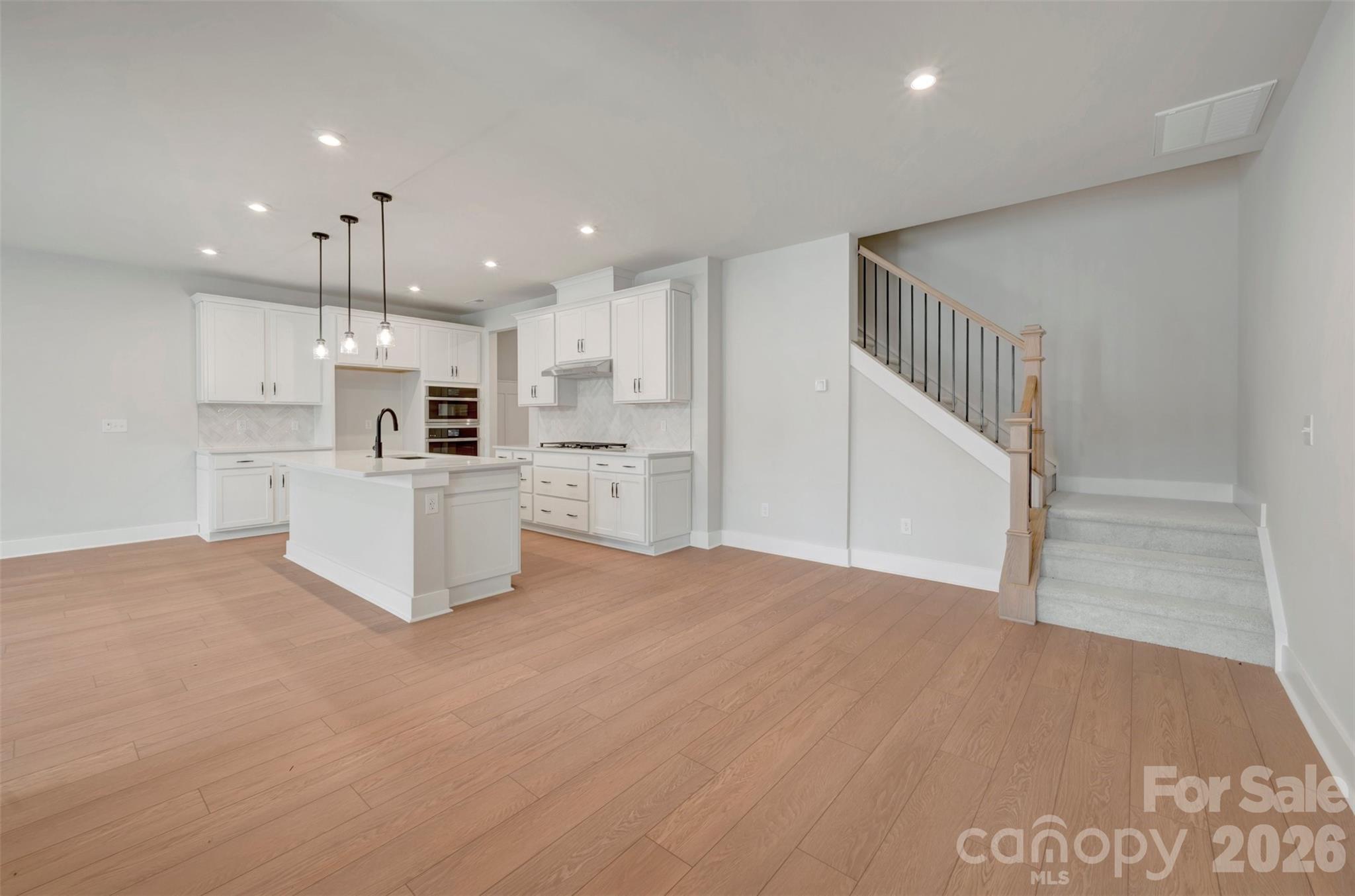 Dining space and stairs with open rails - 314 Ardmore Drive, Belmont