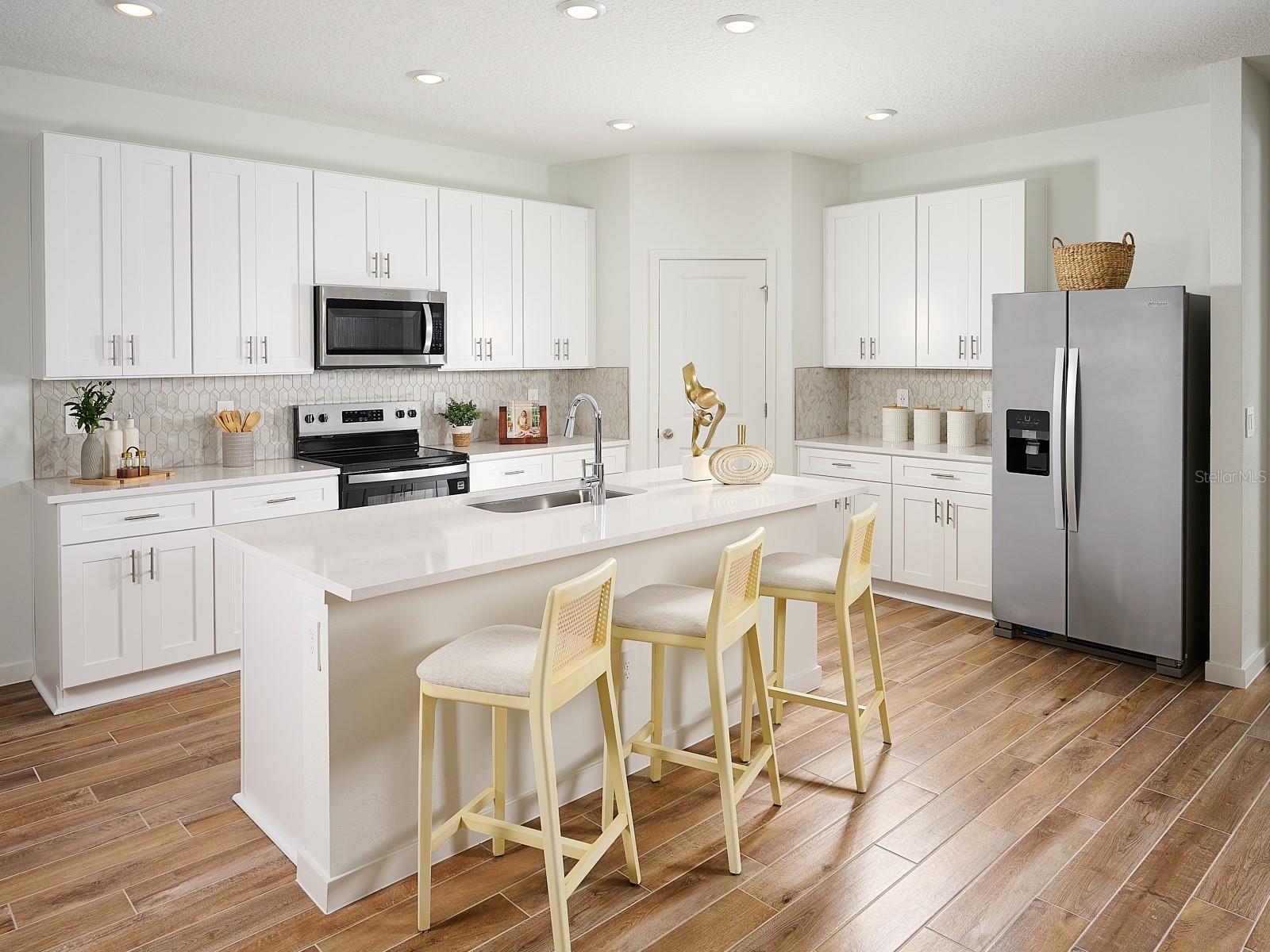 Photo is not of the actual home, but is an inspirational photo of builder’s model home and may depict options, furnishings, and/or decorator features that are not included - 98 TEQUESTA CT, PALM COAST