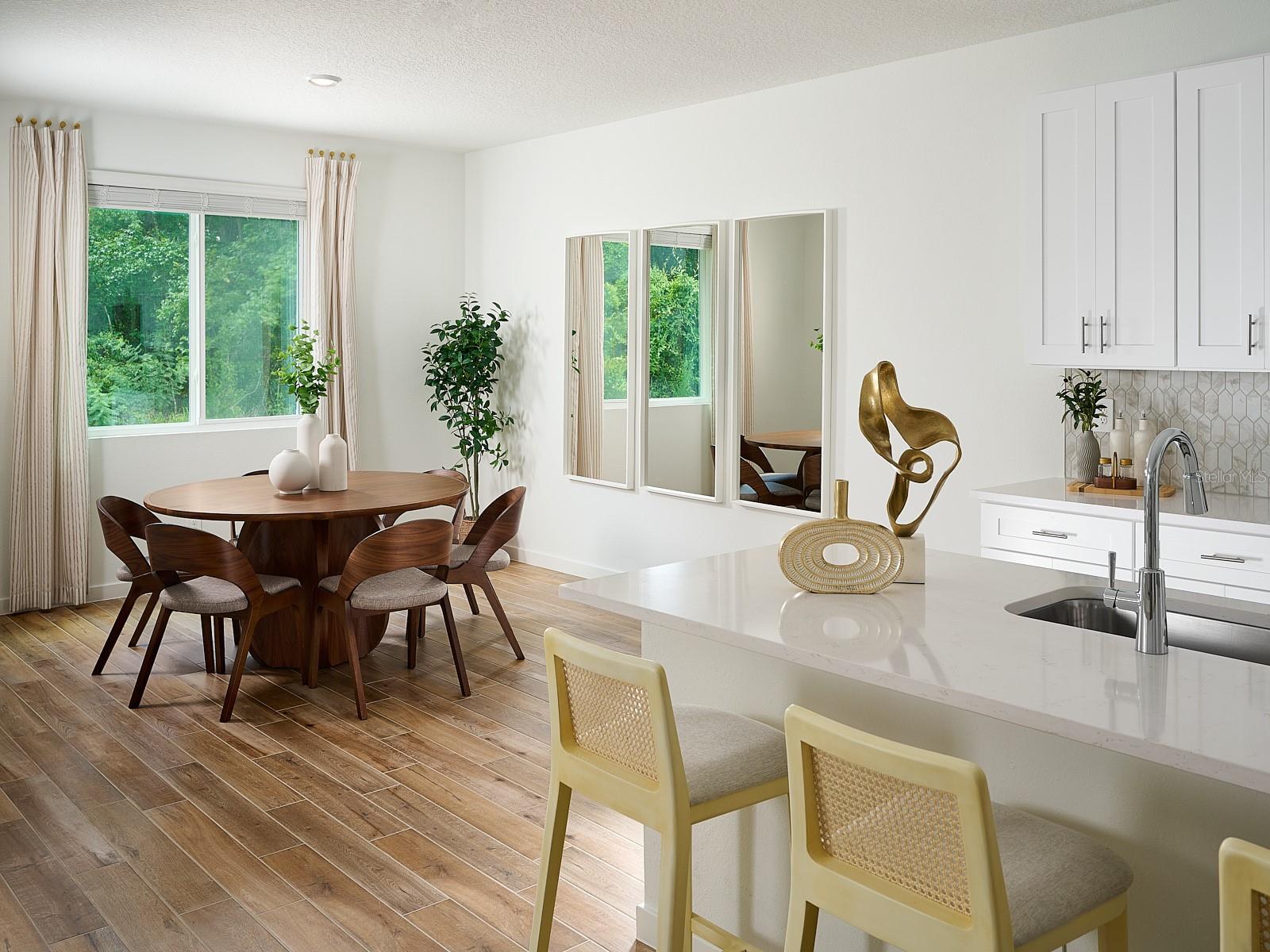 Photo is not of the actual home, but is an inspirational photo of builder’s model home and may depict options, furnishings, and/or decorator features that are not included - 98 TEQUESTA CT, PALM COAST