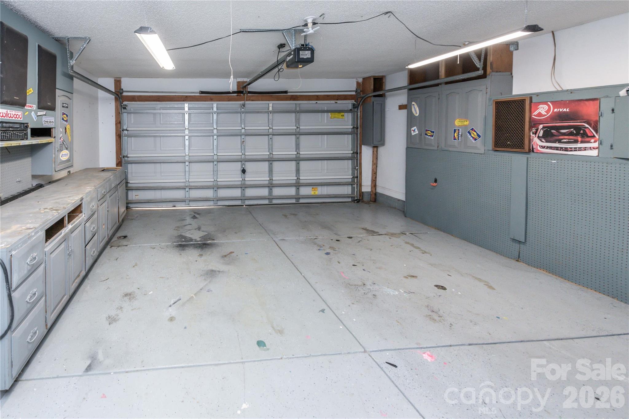 2 car garage with built in cabinets and 240v wiring - 266 Kendra Drive SW, Concord