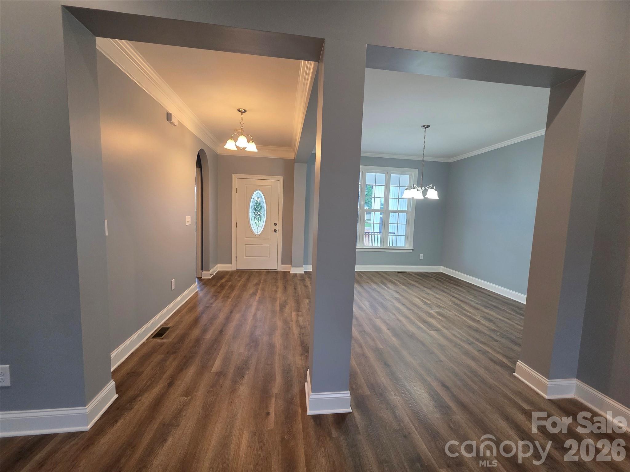Foyer and Dining Room view from Great Room - 5517 Harvest Hills Road, Bessemer City