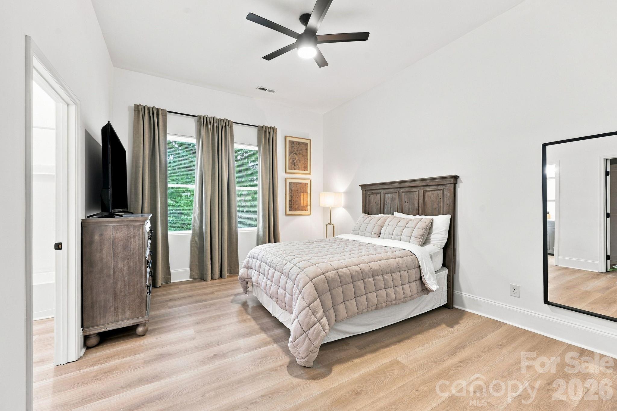 Secondary bedroom on the main level with its own bathroom - 527 S 2nd Street, Albemarle