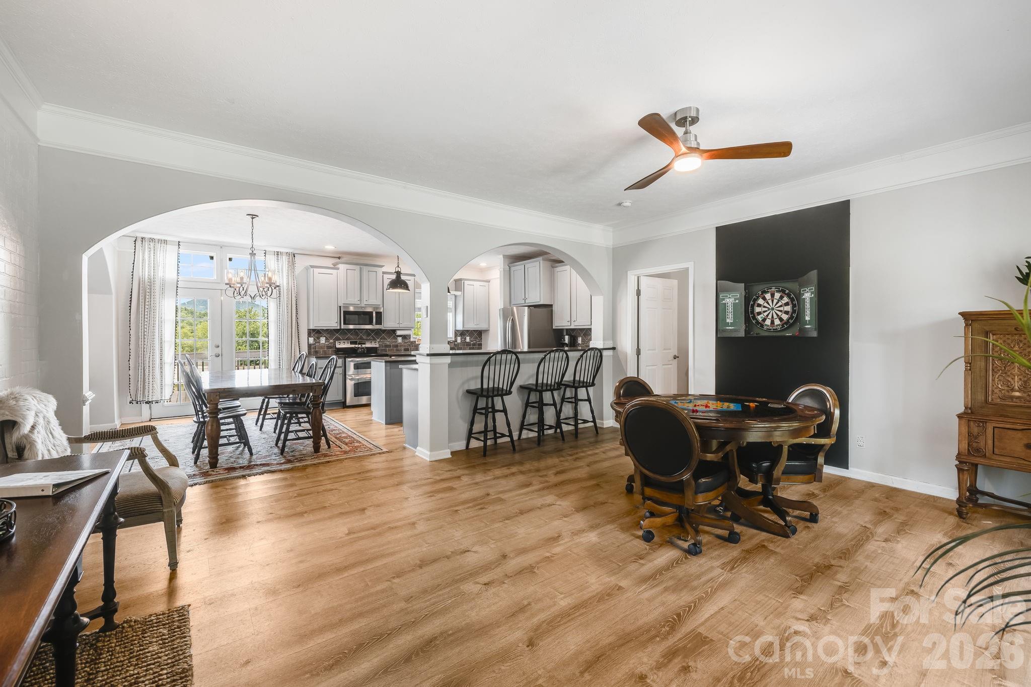 Game room with card table/game table and darts - 21 Old Pinner Place, Arden