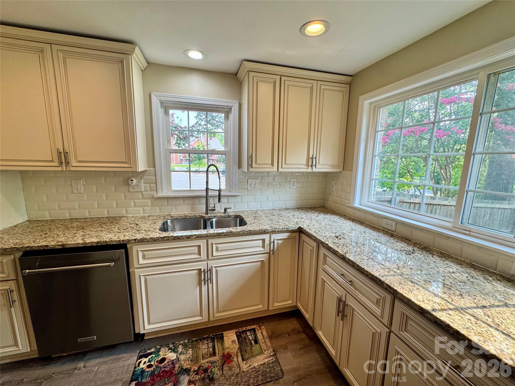 Kitchen-subway tile, custom cabinets and granite countertops. - 205 Tournament Drive SW, Concord