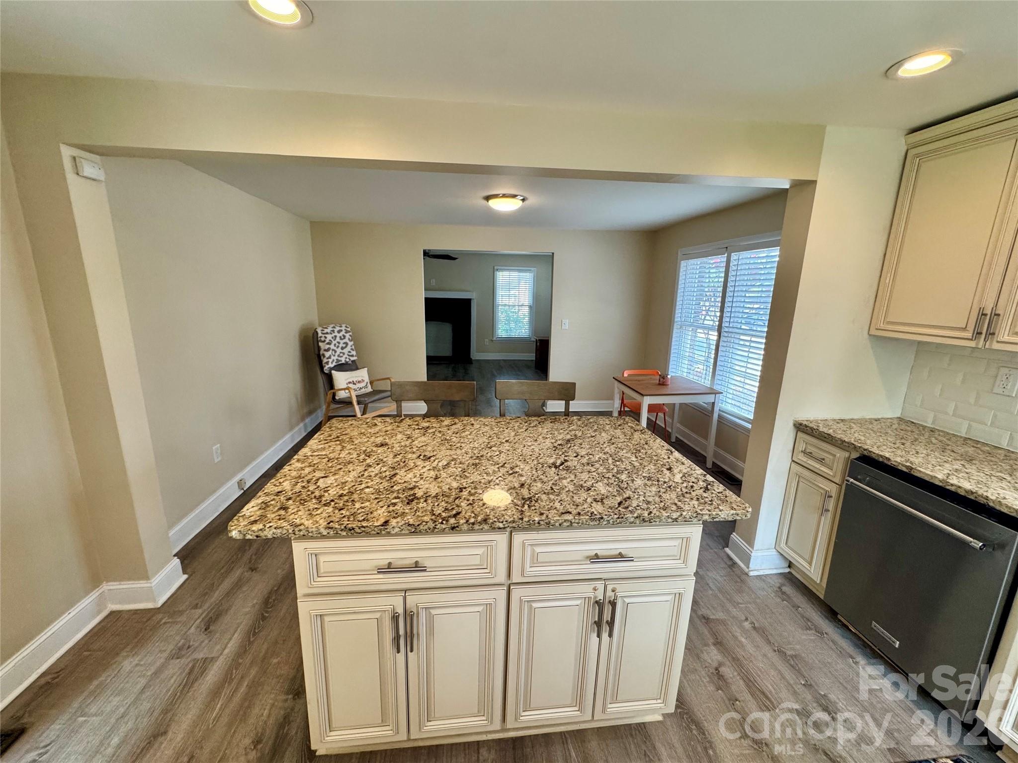Kitchen looking into the dining and living room - 205 Tournament Drive SW, Concord