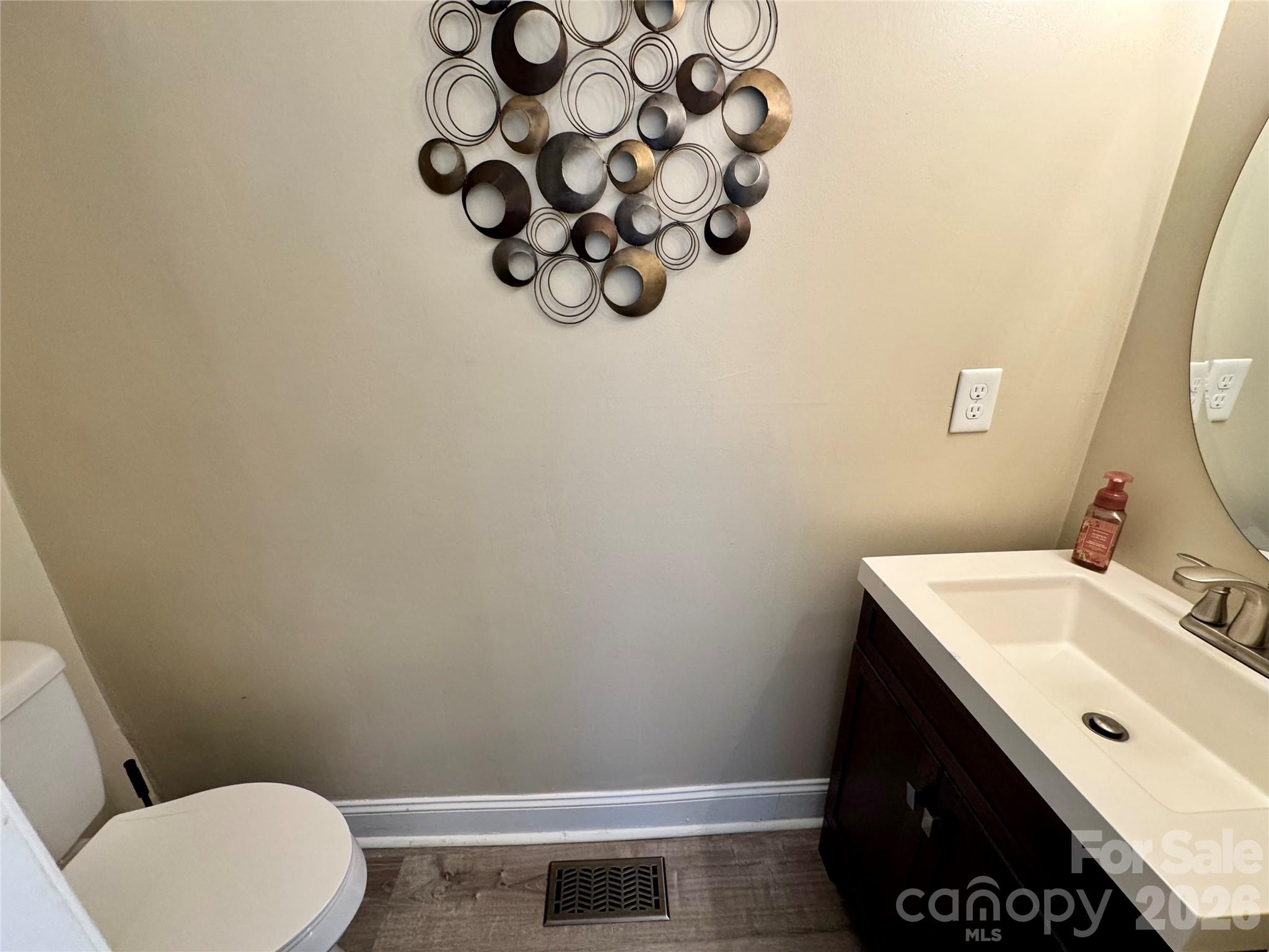 Half bath on the main level - 205 Tournament Drive SW, Concord
