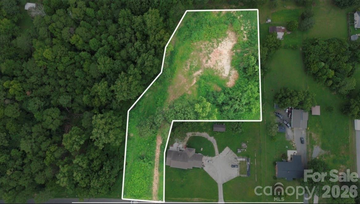 Driveway roughed-in. Build site cleared and staked. - 2330 Montford Avenue NW, Concord