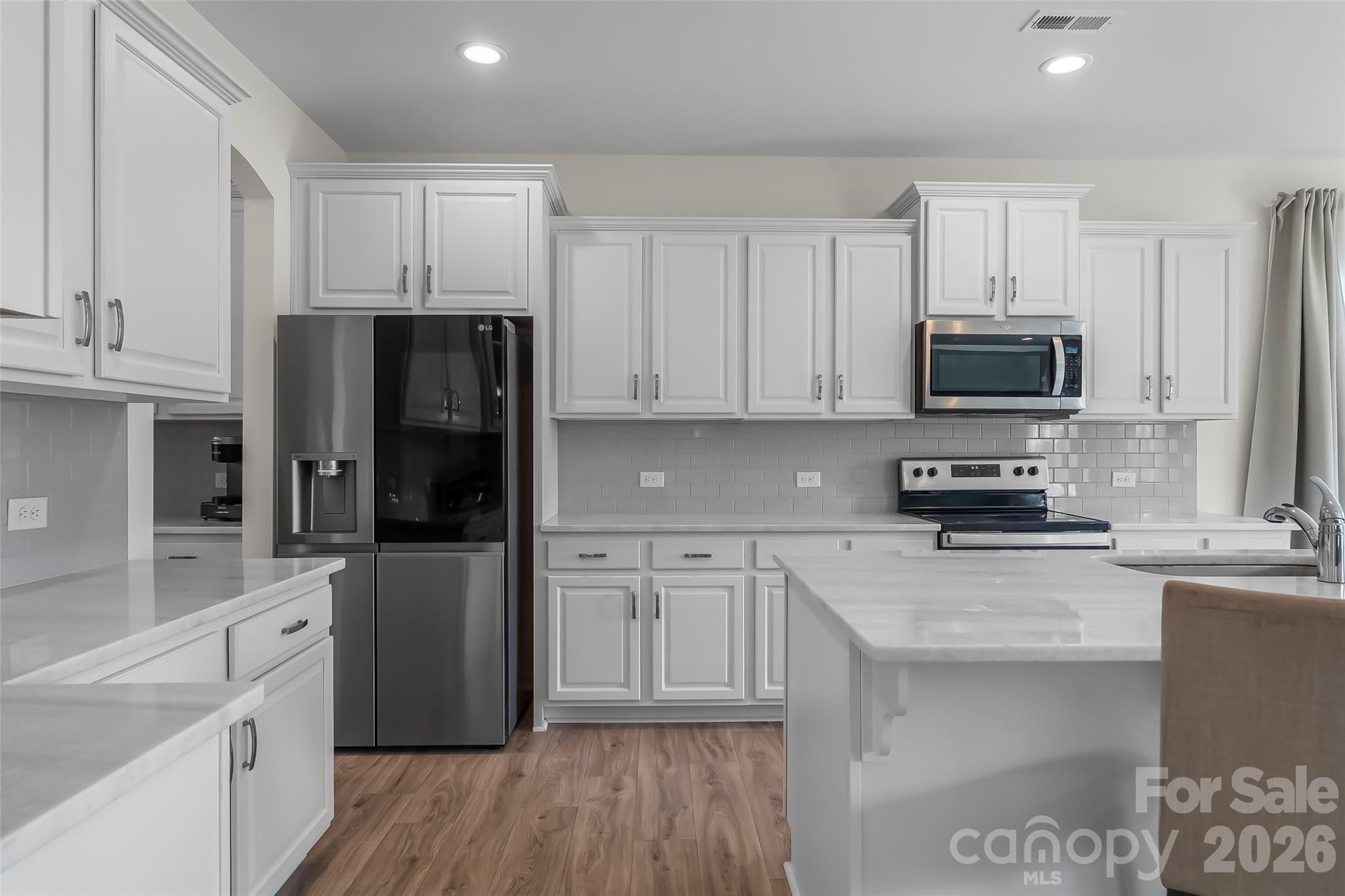 Smart LG refrigerator with knock on door and Craft ice feature - 112 Divot Lane, Statesville