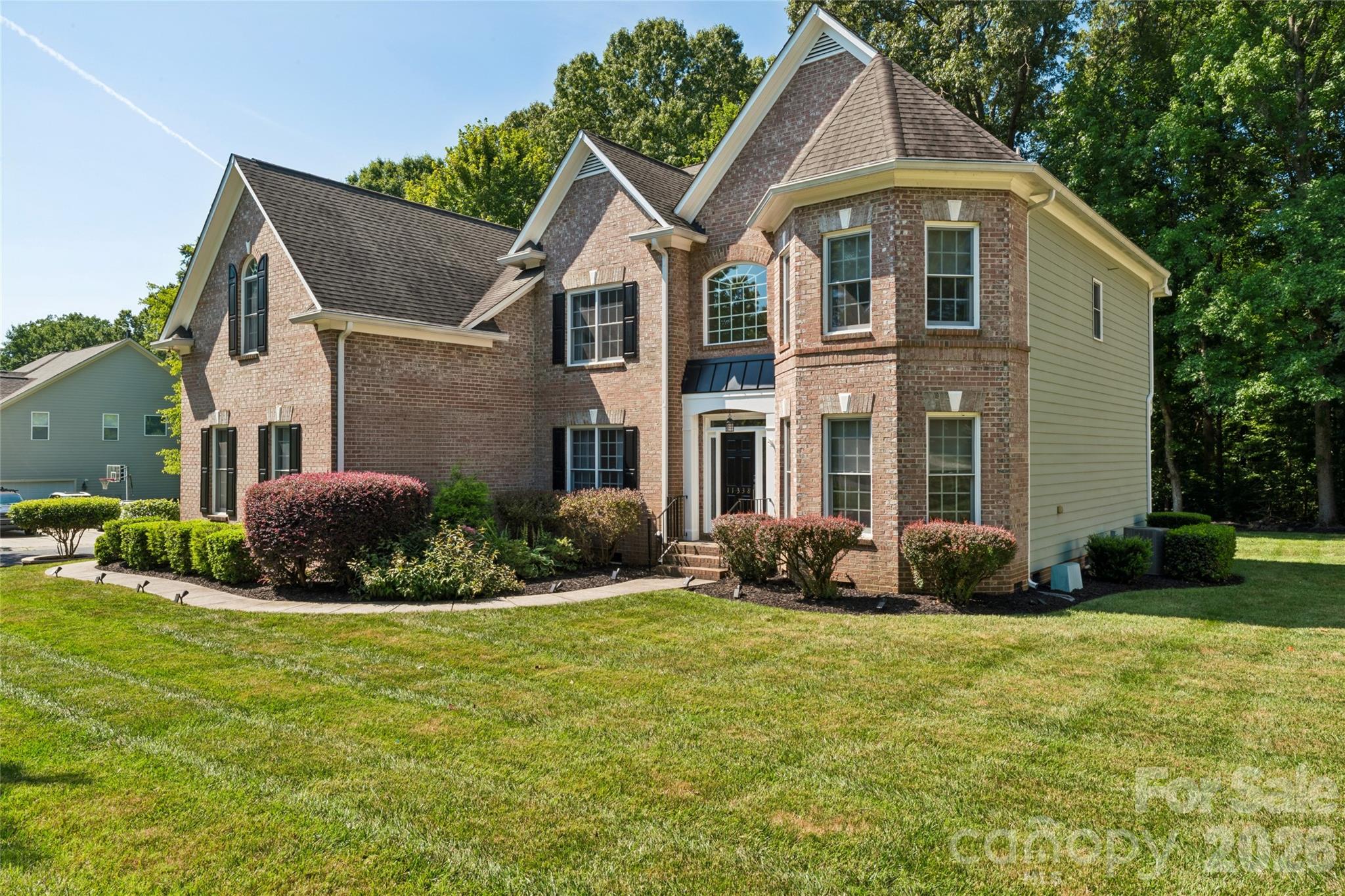 Single Family Residence at 11338 Canoe Cove Lane, Huntersville, photo 2 of 41