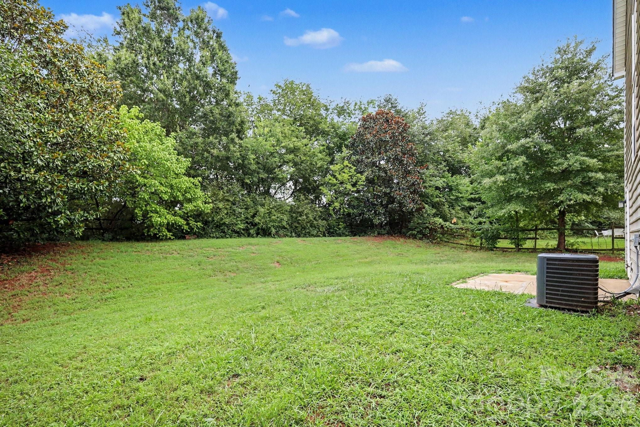 Single Family Residence at 16034 Farmall Drive, Huntersville, photo 3 of 24
