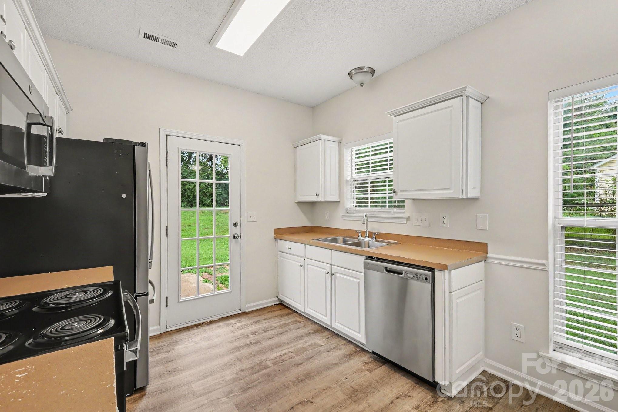 Single Family Residence at 16034 Farmall Drive, Huntersville, photo 12 of 24
