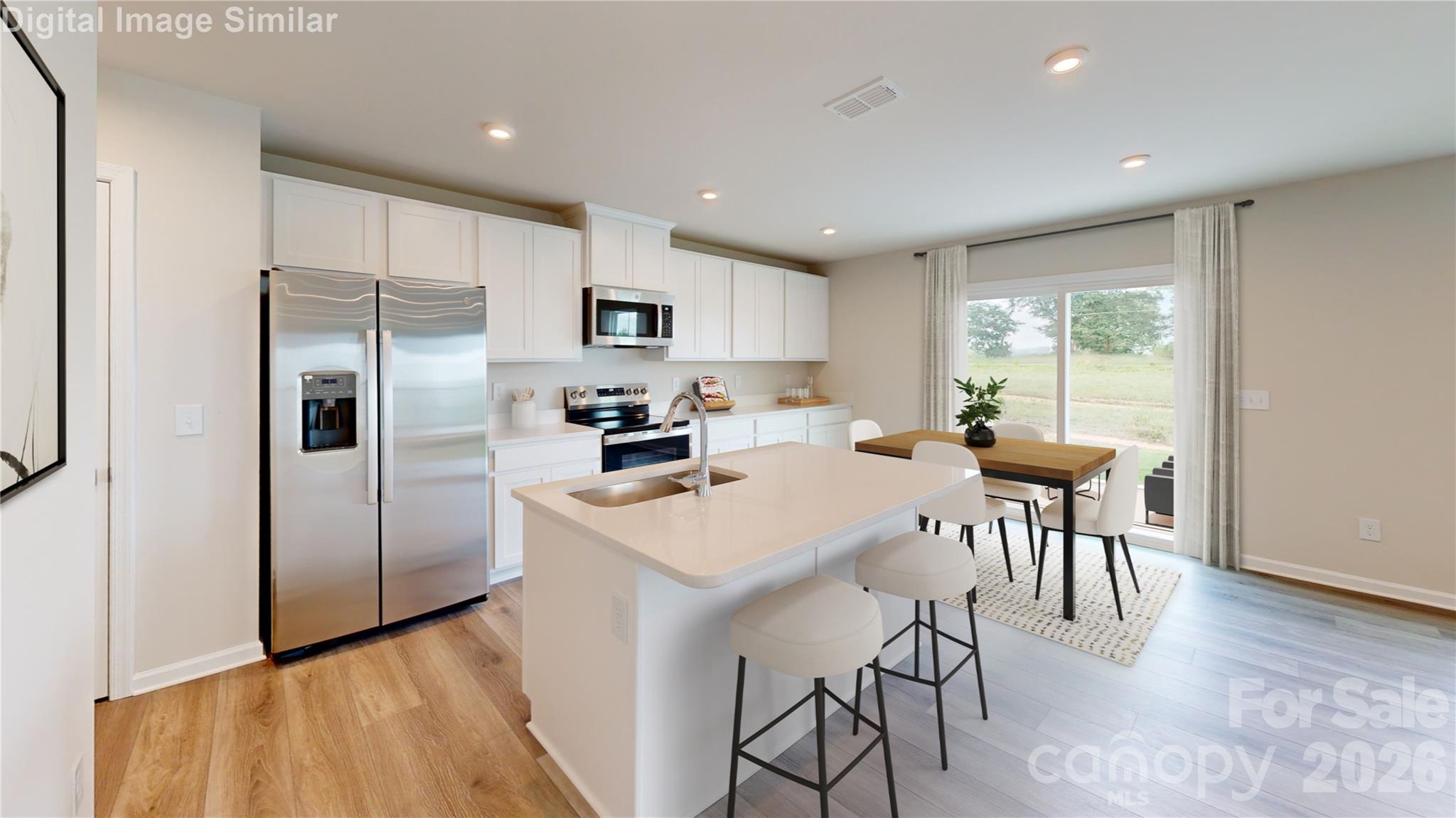 Sleek Stainless Steel Appliances, a kitchen that inspires - feel like a chef in your own culinary playground! - 1208 Elm Forest Lane, China Grove