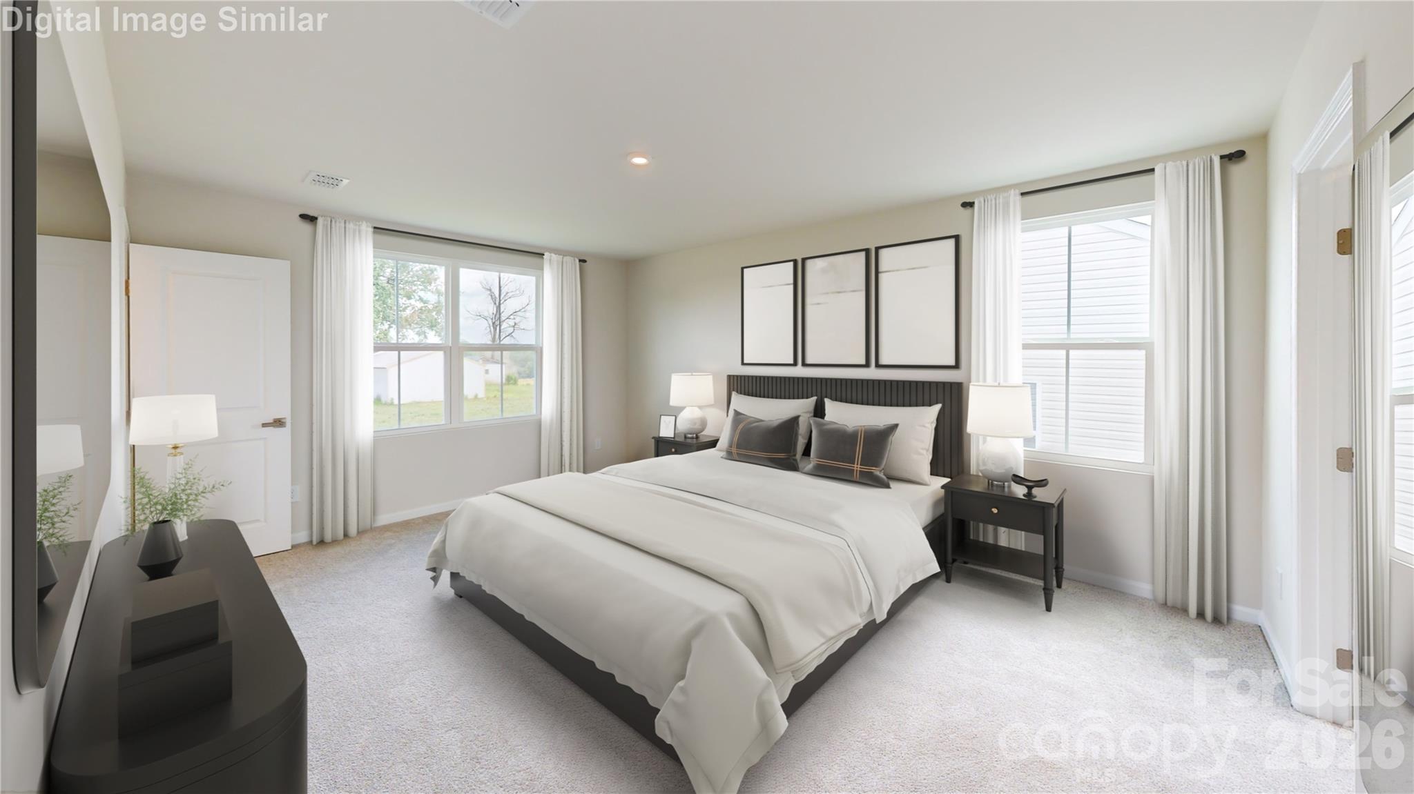 Welcome to your private oasis! Sun-drenched windows, generous space, and a dreamy walk-in closet — this bedroom is all about comfort and calm with a touch of luxury! - 1208 Elm Forest Lane, China Grove