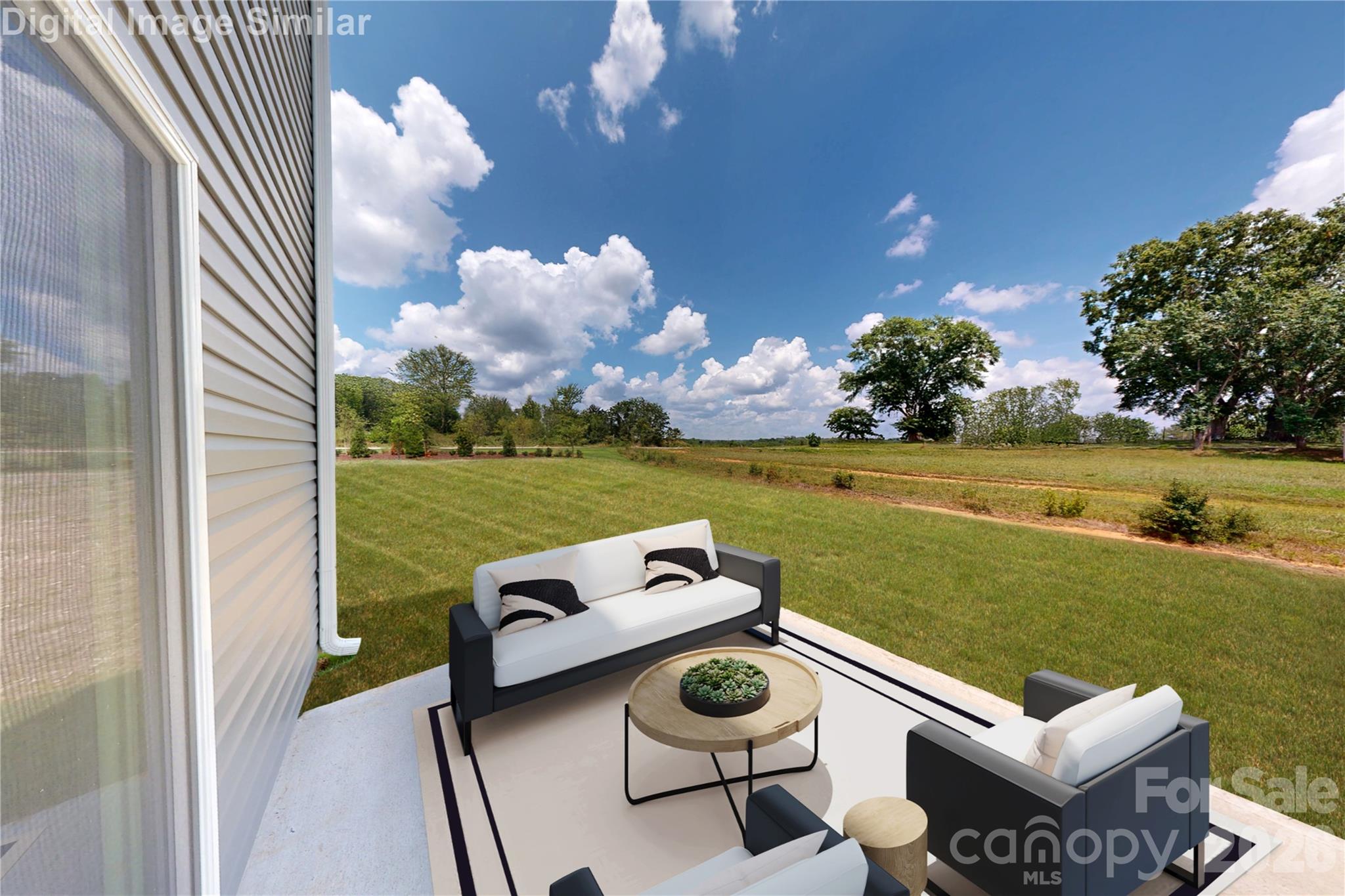 Chic vibes and sunshine for days! This dreamy patio and private backyard are made for morning coffees, evening chats, and everything in between! - 1208 Elm Forest Lane, China Grove