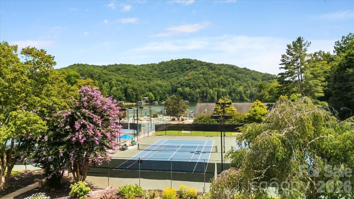 This property features extensive amenities at Rumbling Bald, offering a premier lifestyle experience. - 179 Rock Spring Road, Lake Lure