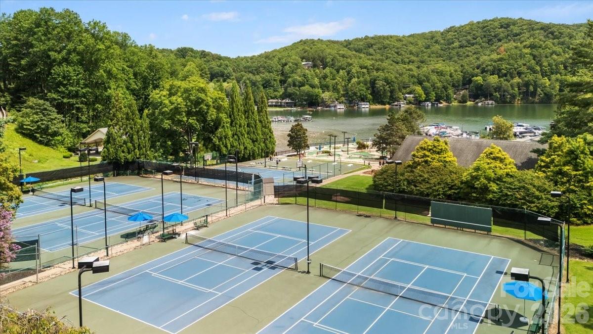 This property features extensive amenities at Rumbling Bald, offering a premier lifestyle experience. - 179 Rock Spring Road, Lake Lure