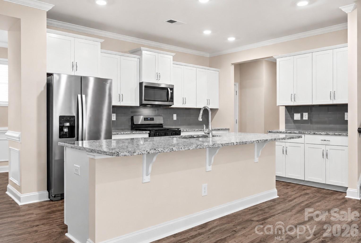 Spacious kitchen with oversized island and abundant cabinetry. - 4103 Steel Way, Sherrills Ford