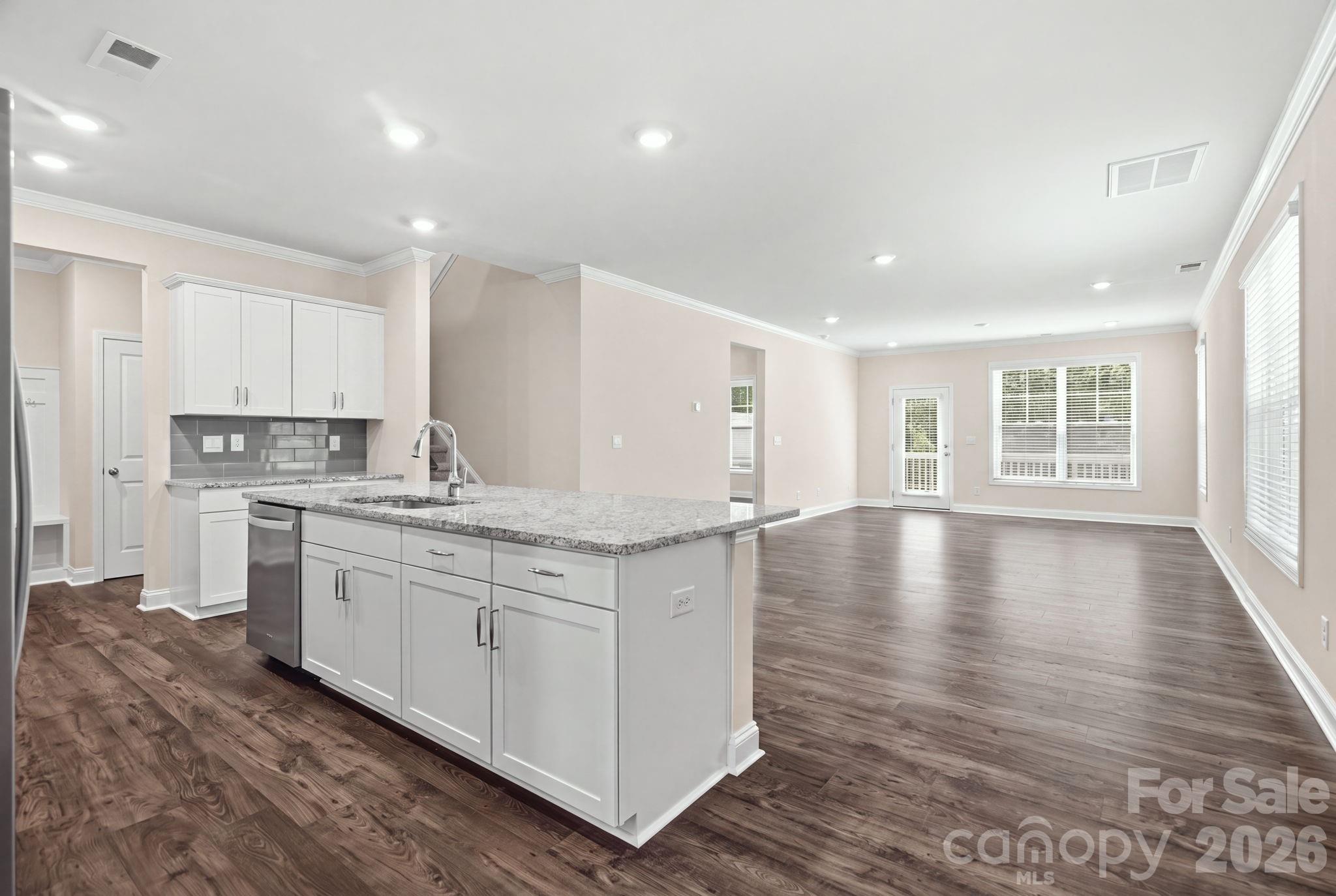 Inviting living area at the heart of the open-concept design. - 4103 Steel Way, Sherrills Ford