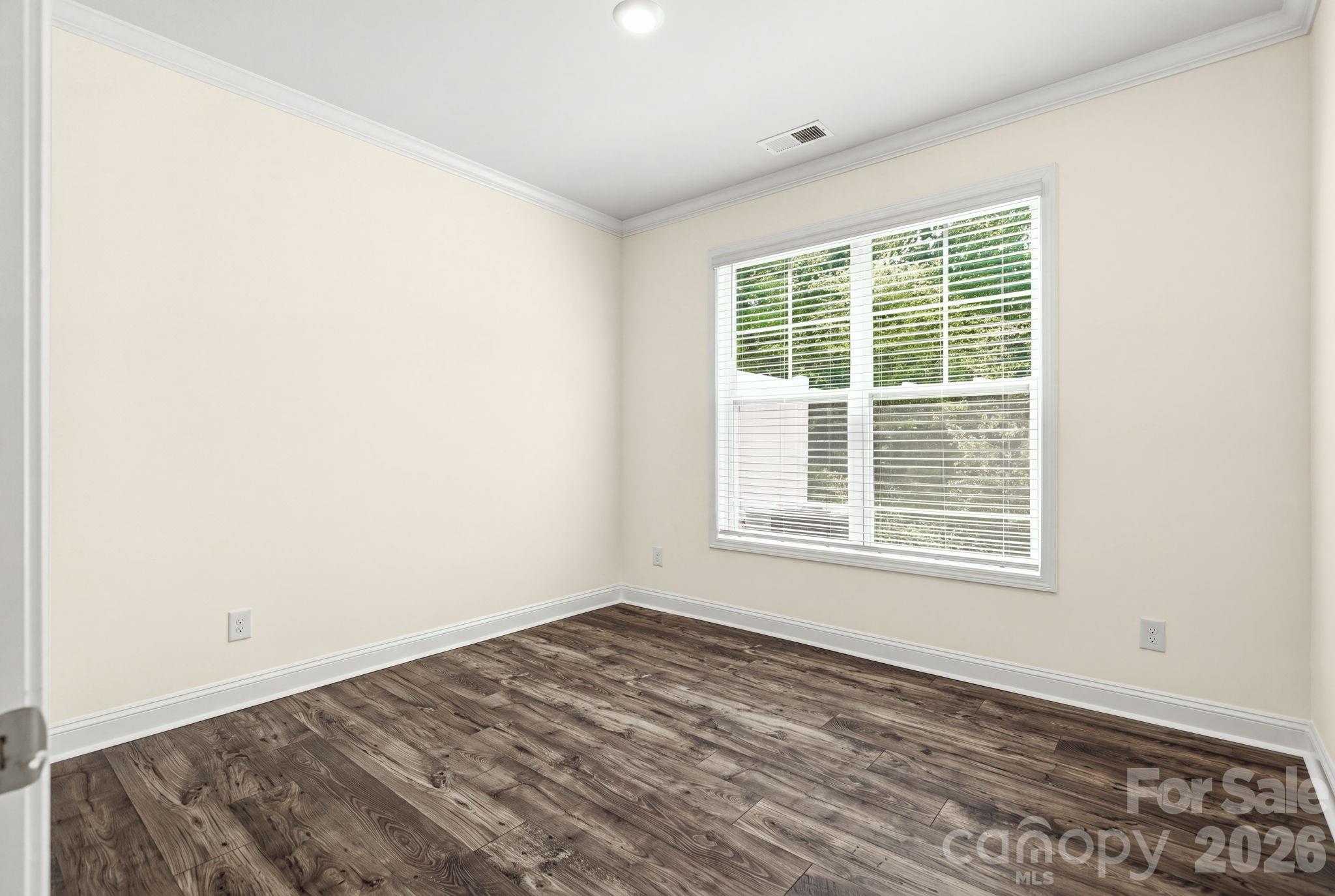 Flexible main-level bedroom ideal for guests or a home office. - 4103 Steel Way, Sherrills Ford
