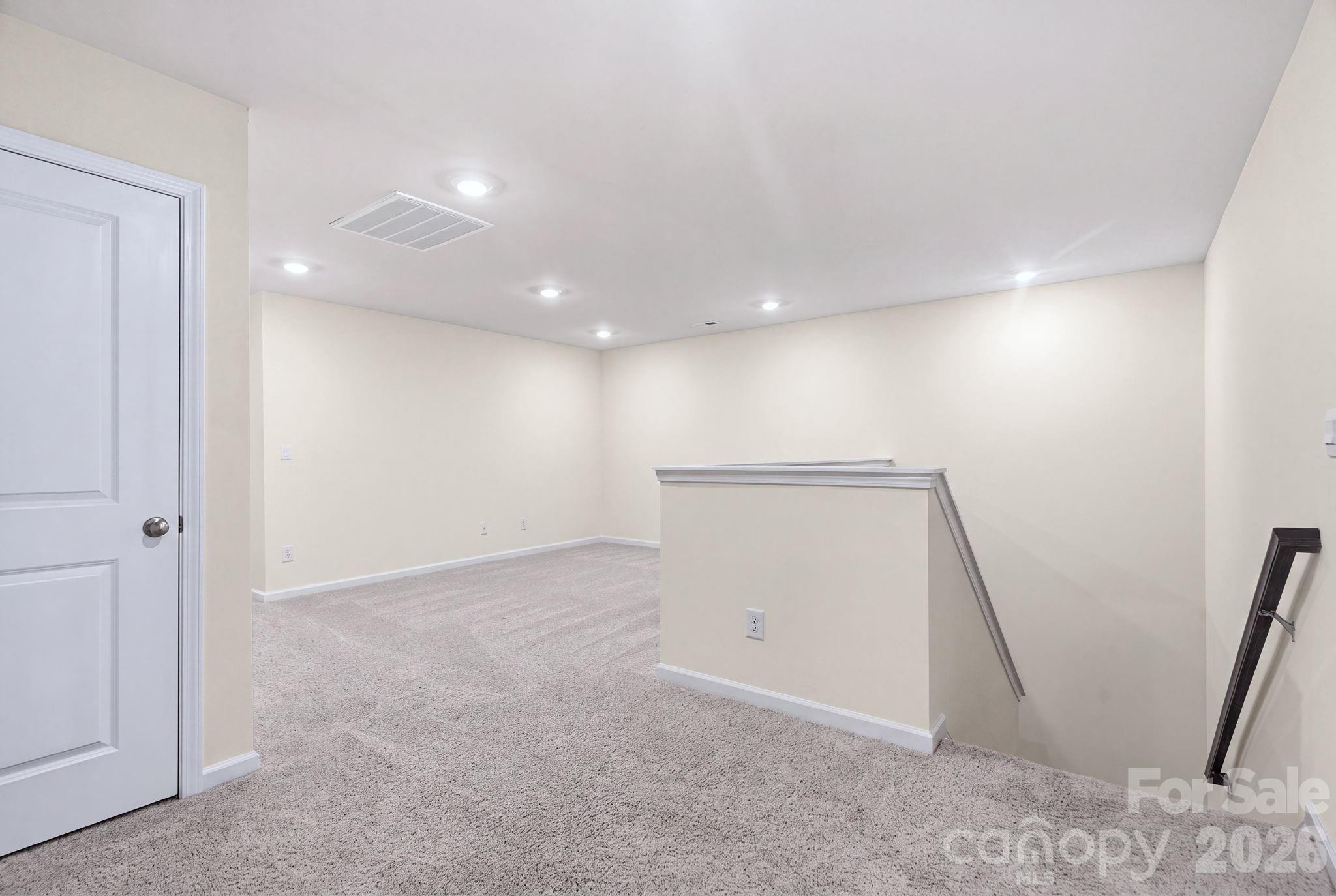 Versatile loft perfect for a media room, play area, or second living space. - 4103 Steel Way, Sherrills Ford