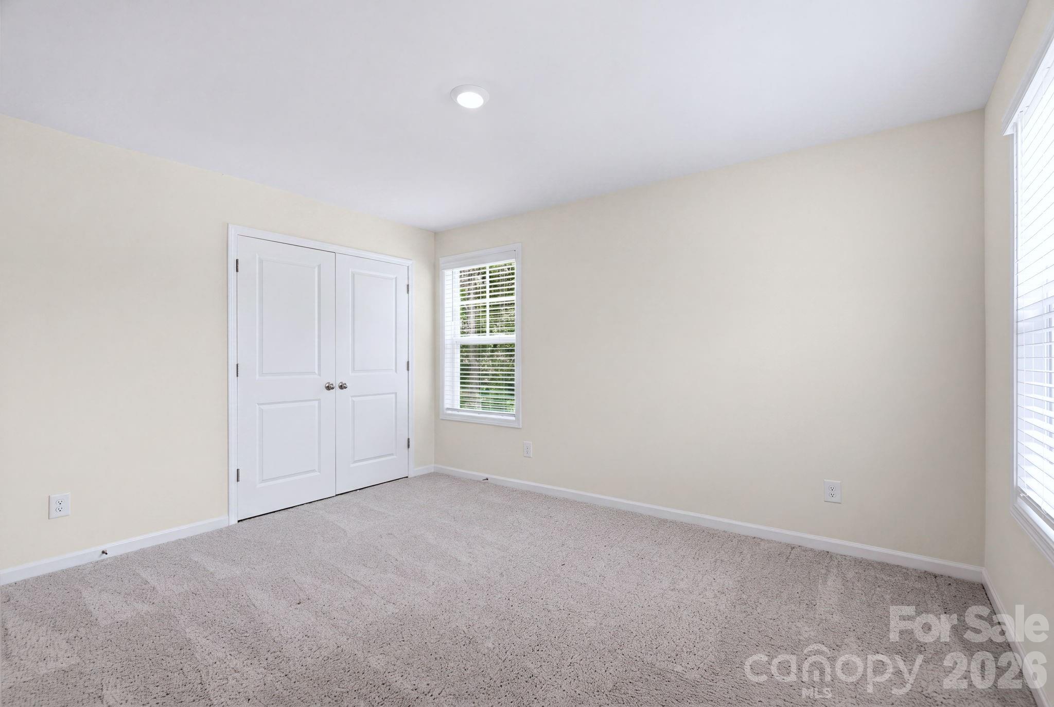 Comfortable secondary bedroom with abundant natural light. - 4103 Steel Way, Sherrills Ford