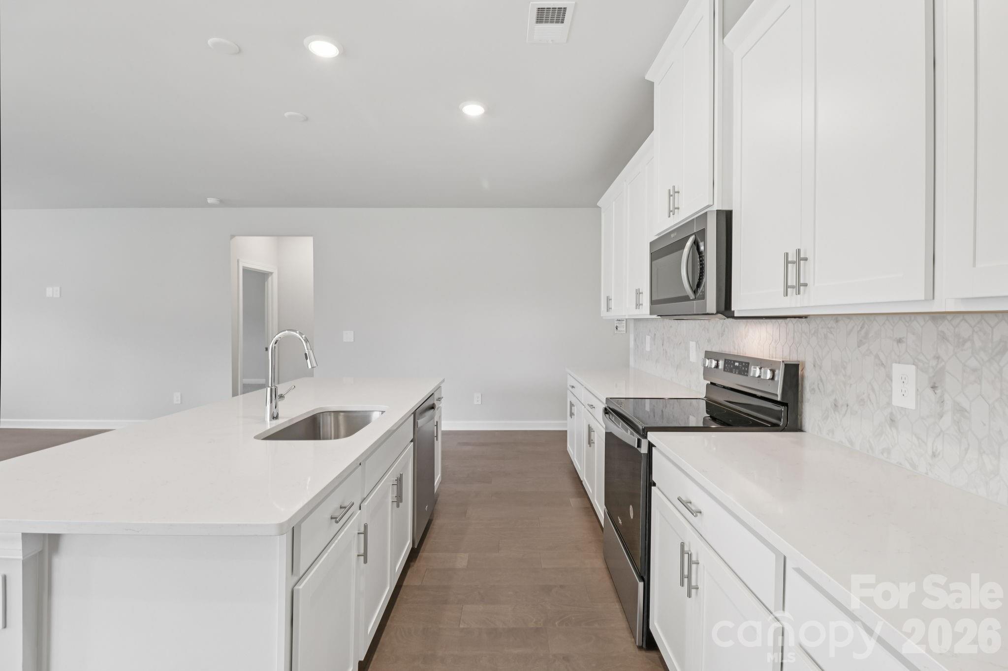 Photo is not of the actual home, but is an inspirational photo of builder’s model home and may depict options, furnishings, and/or decorator features that are not included - 1606 Harper Landing Boulevard, Stanley