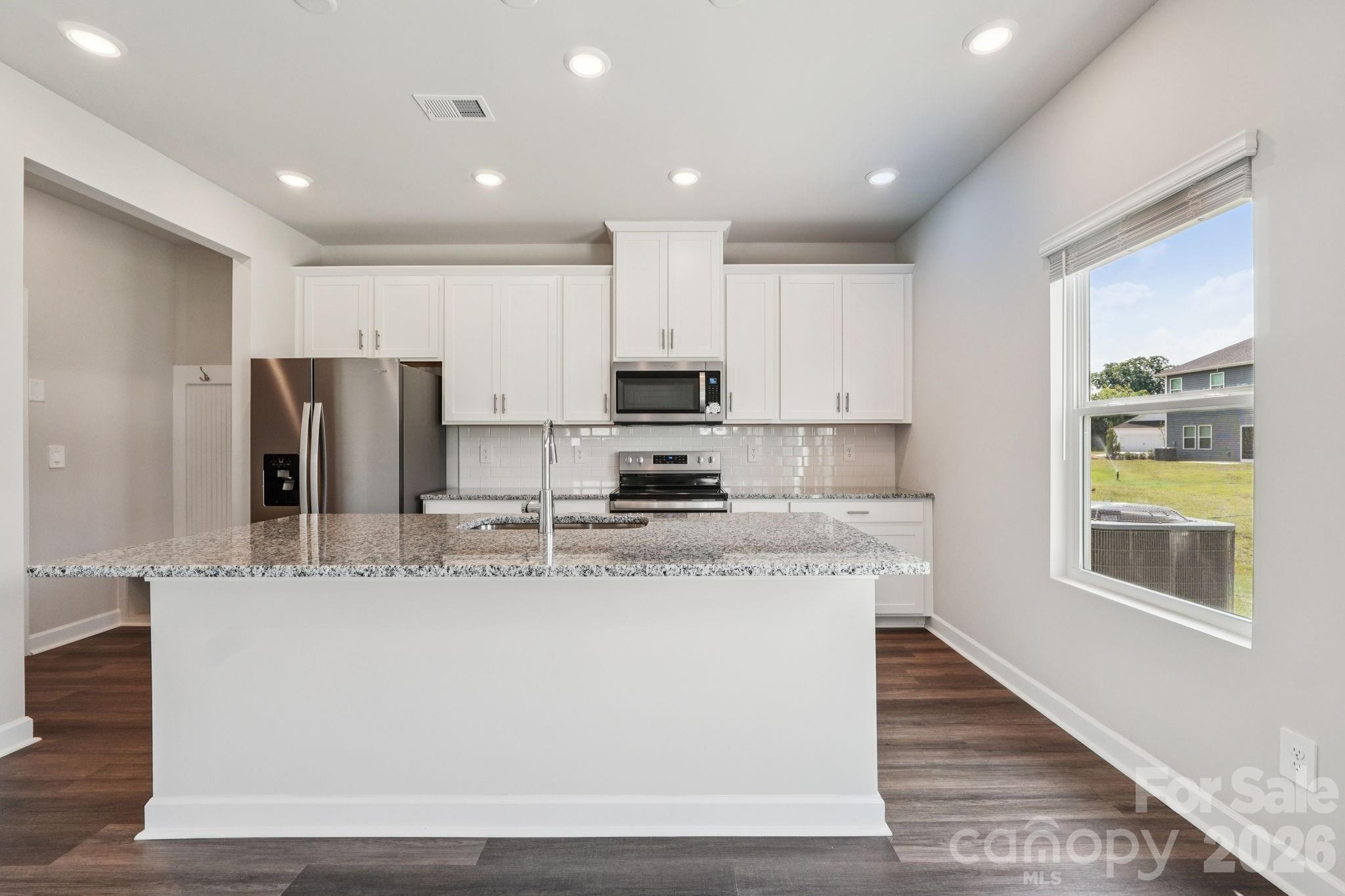 Photo is not of the actual home but is an inspirational photo of builder’s model home and may depict options, furnishings, and/or decorator features that are not included. - 1604 Harper Landing Boulevard, Stanley