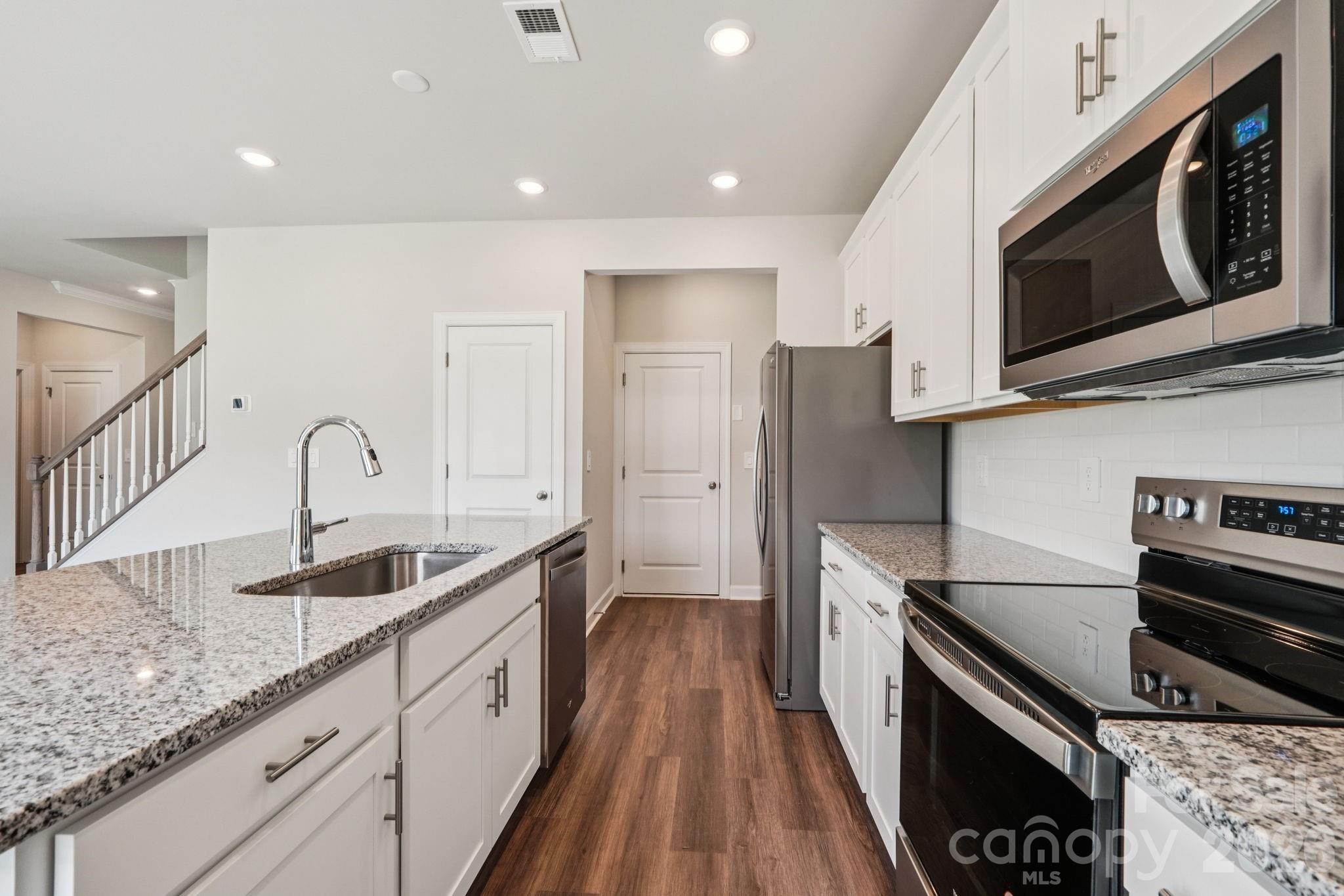 Photo is not of the actual home but is an inspirational photo of builder’s model home and may depict options, furnishings, and/or decorator features that are not included. - 1604 Harper Landing Boulevard, Stanley