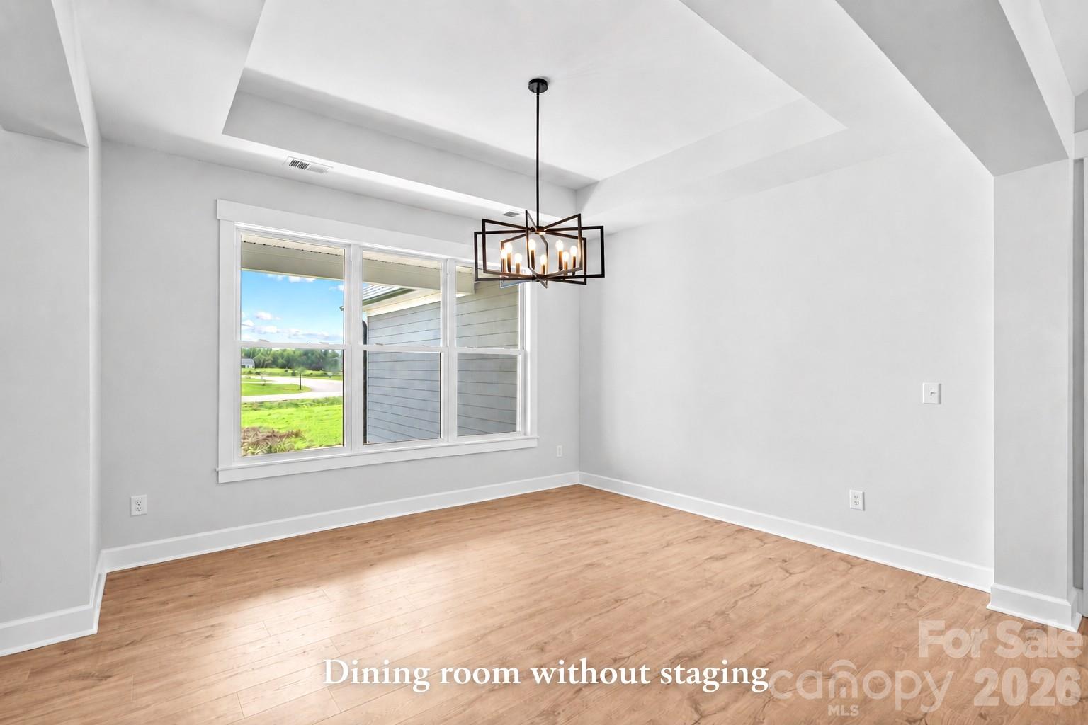 Dining with tray ceiling. (Shows Dining not virtually staged.) - 1205 Coppergate Drive, Salisbury