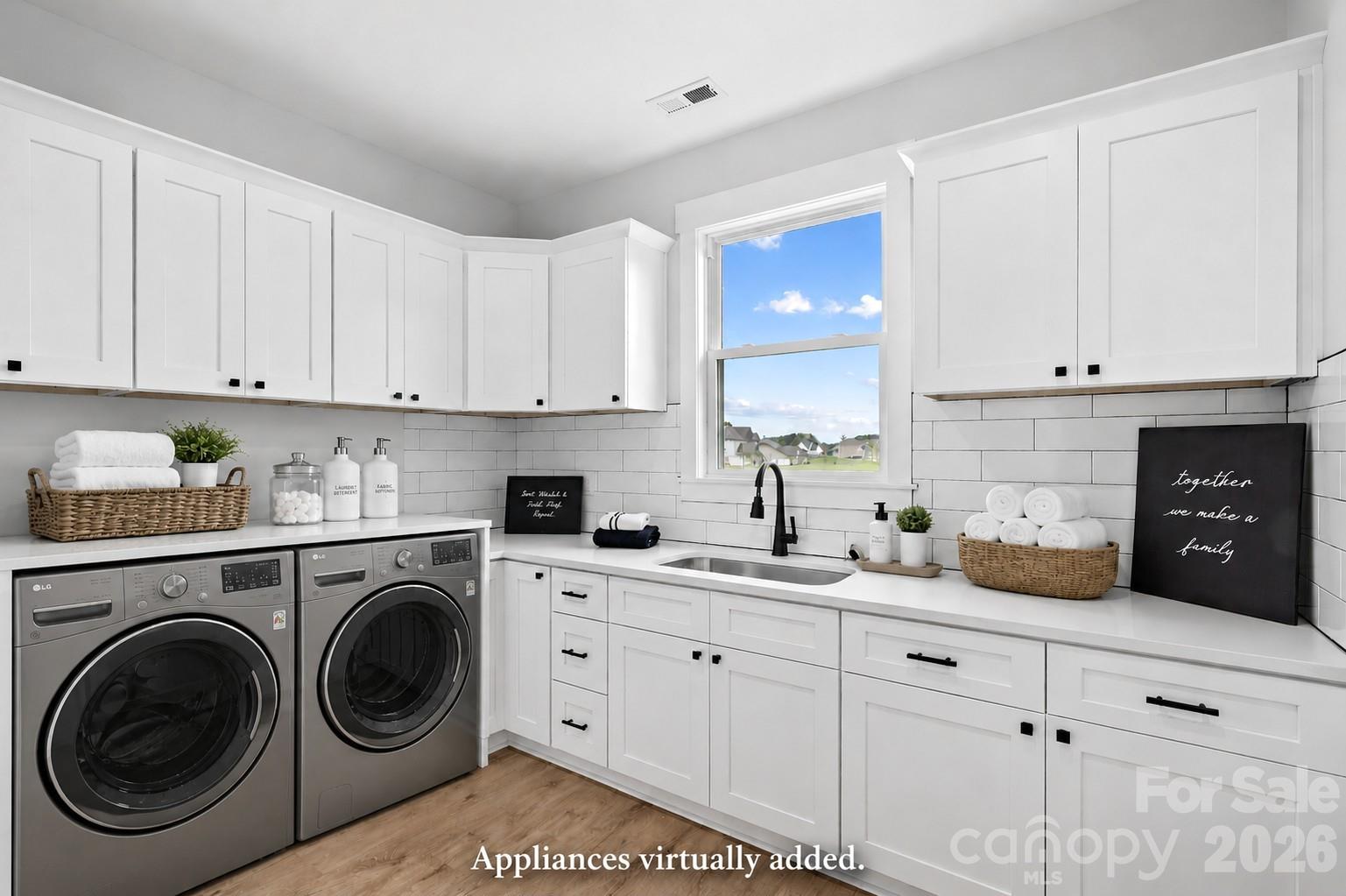 Wow! Laundry Room has more cabinets than some kitchens. (Appliances virtually staged.) - 1205 Coppergate Drive, Salisbury