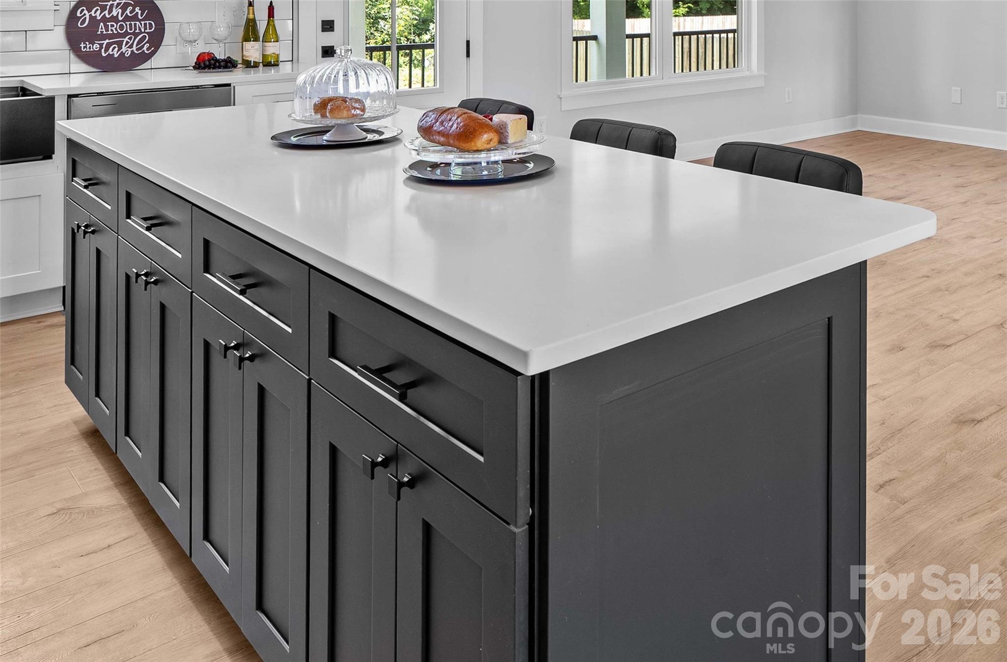 Large island with quartz counters & storage. - 1205 Coppergate Drive, Salisbury
