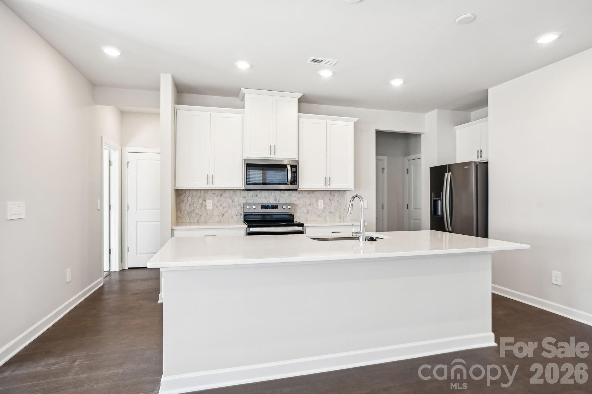 Photo is not of the actual home but is an inspirational photo of builder’s model home and may depict options, furnishings, and/or decorator features that are not included.Photo is not of the actual home but is an inspirational photo of builder’s model home and may depict options, furnishings, and/or decorator features that are not included. - 2626 Celestial Drive, Newton