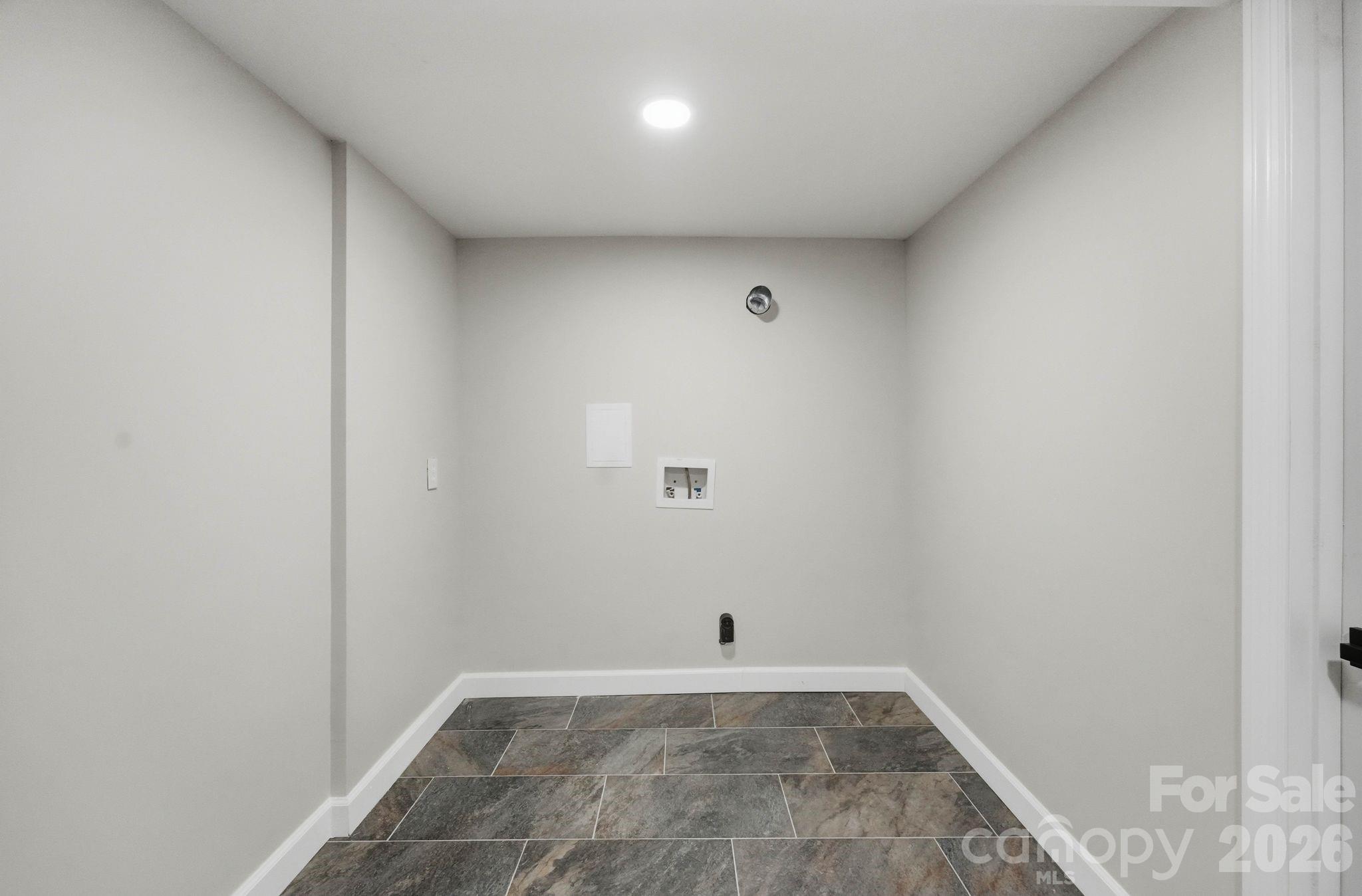 Full Laundry Room in Basement - 19924 Floral Lane, Cornelius