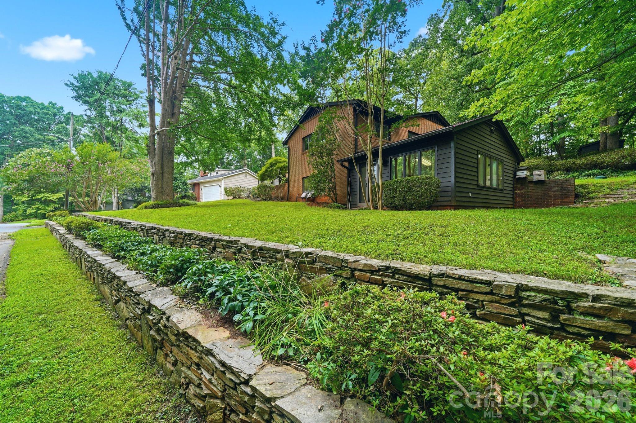 Walk-out lower level is great for a private guest retreat or Multi Generational Living - 515 Dogwood Lane, Belmont