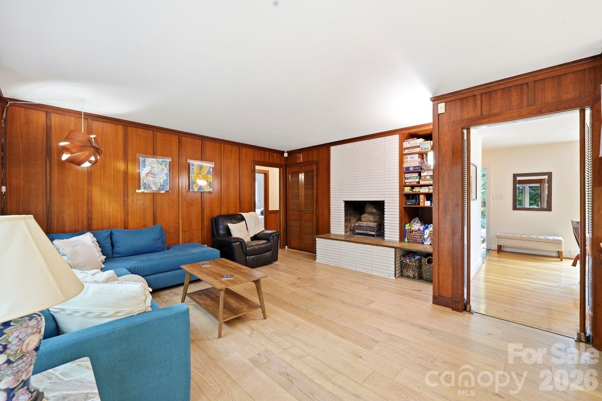 Stunning real wood panelling and stone fireplace. - 515 Dogwood Lane, Belmont