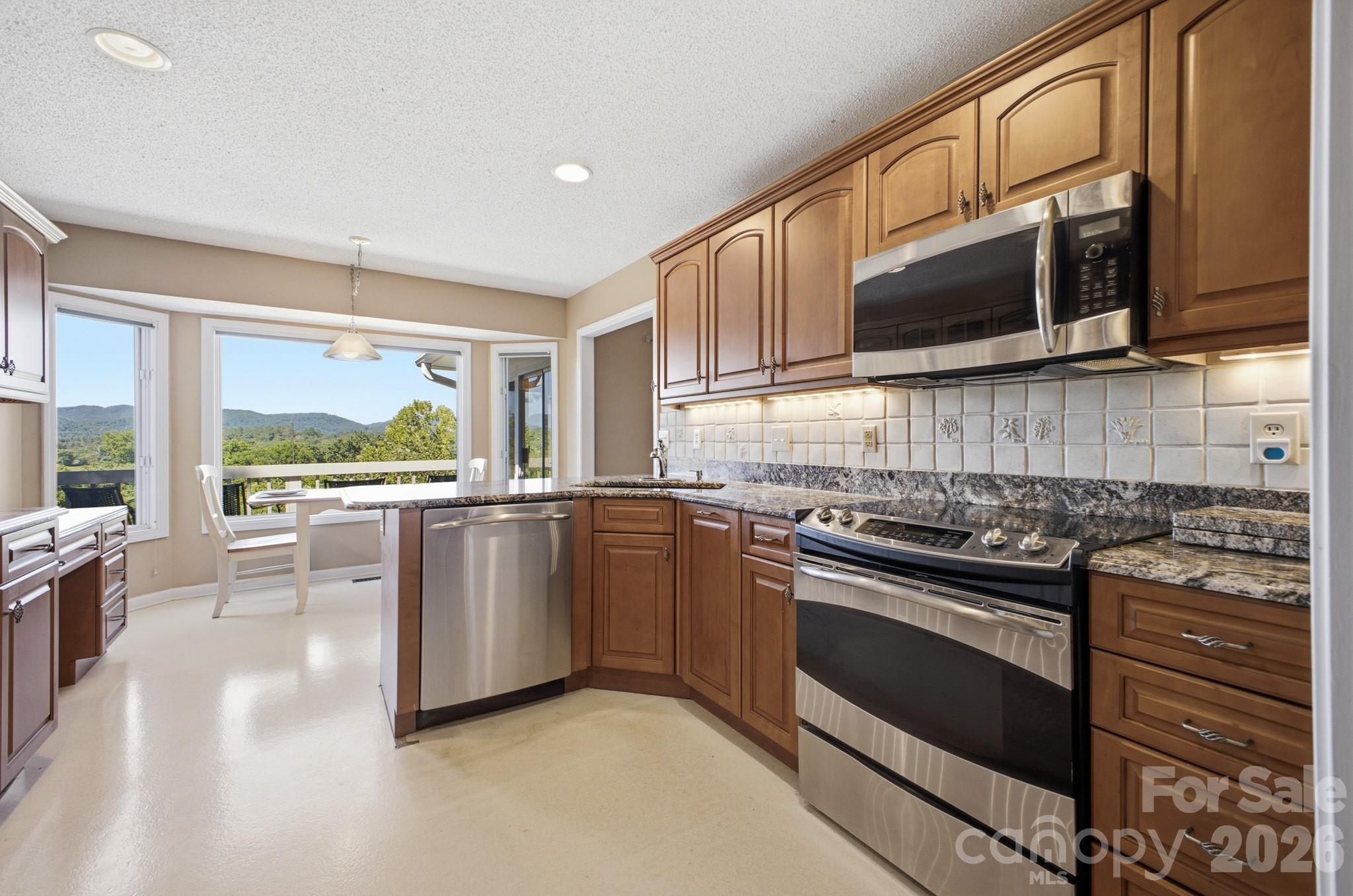 Enjoy beautiful Mountain Views from the kitchen. - 1870 Riverview Court, Hendersonville