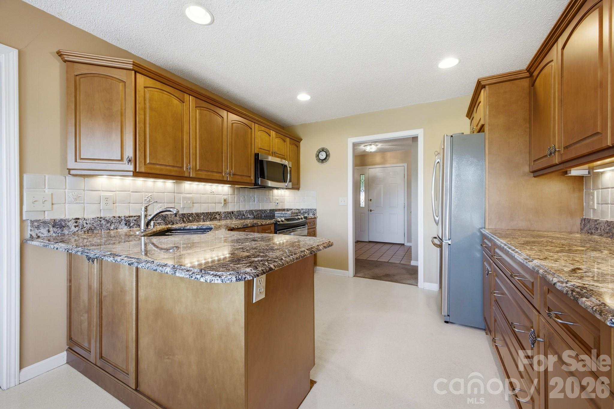 Breakfast Bar in the Kitchen - 1870 Riverview Court, Hendersonville