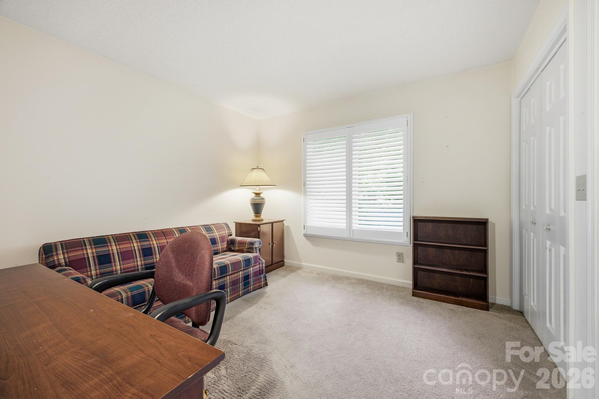 Bedroom #3 has Plantation Shutters - 1870 Riverview Court, Hendersonville